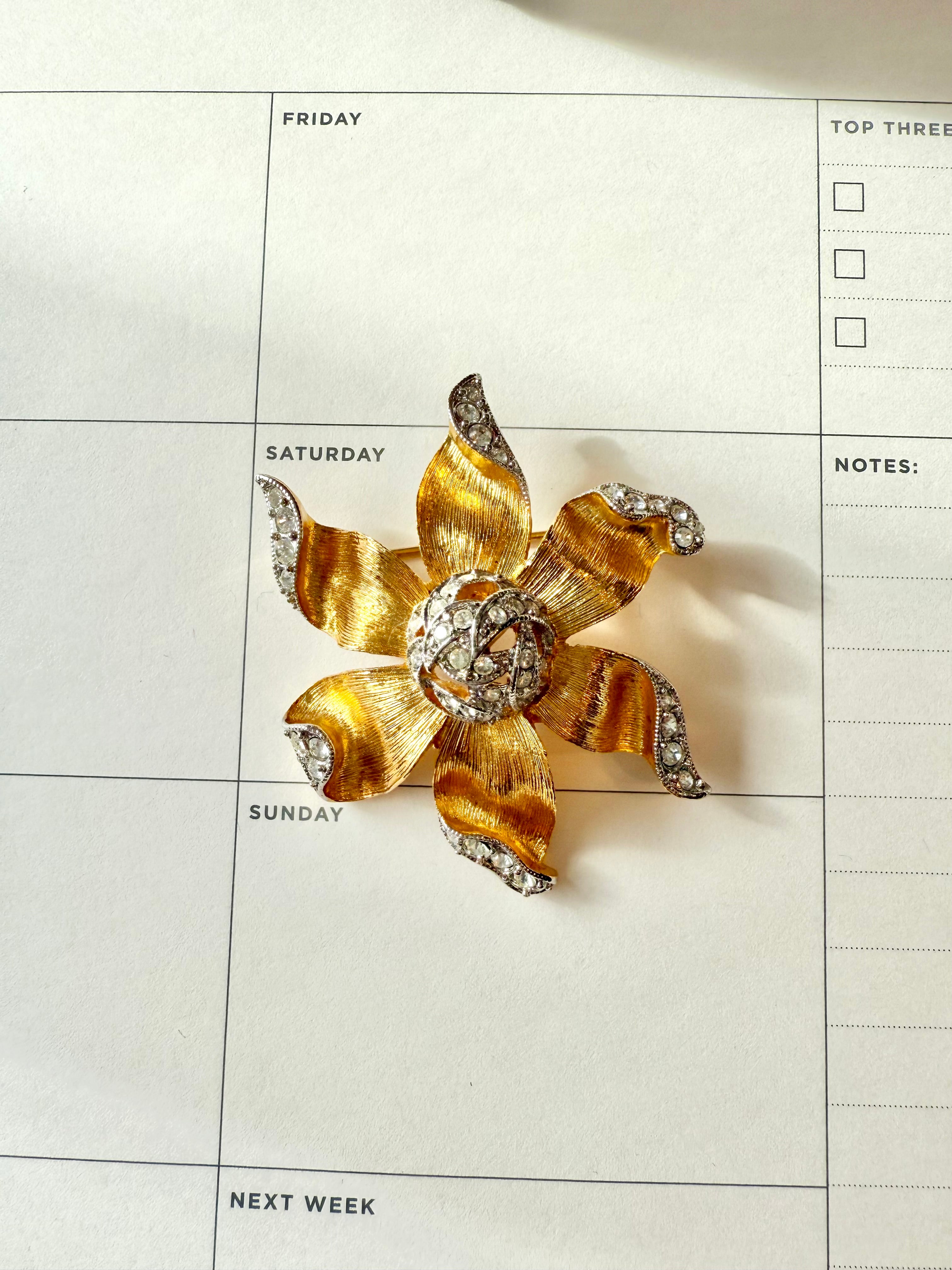 The most elegant gold and silver flower brooch....