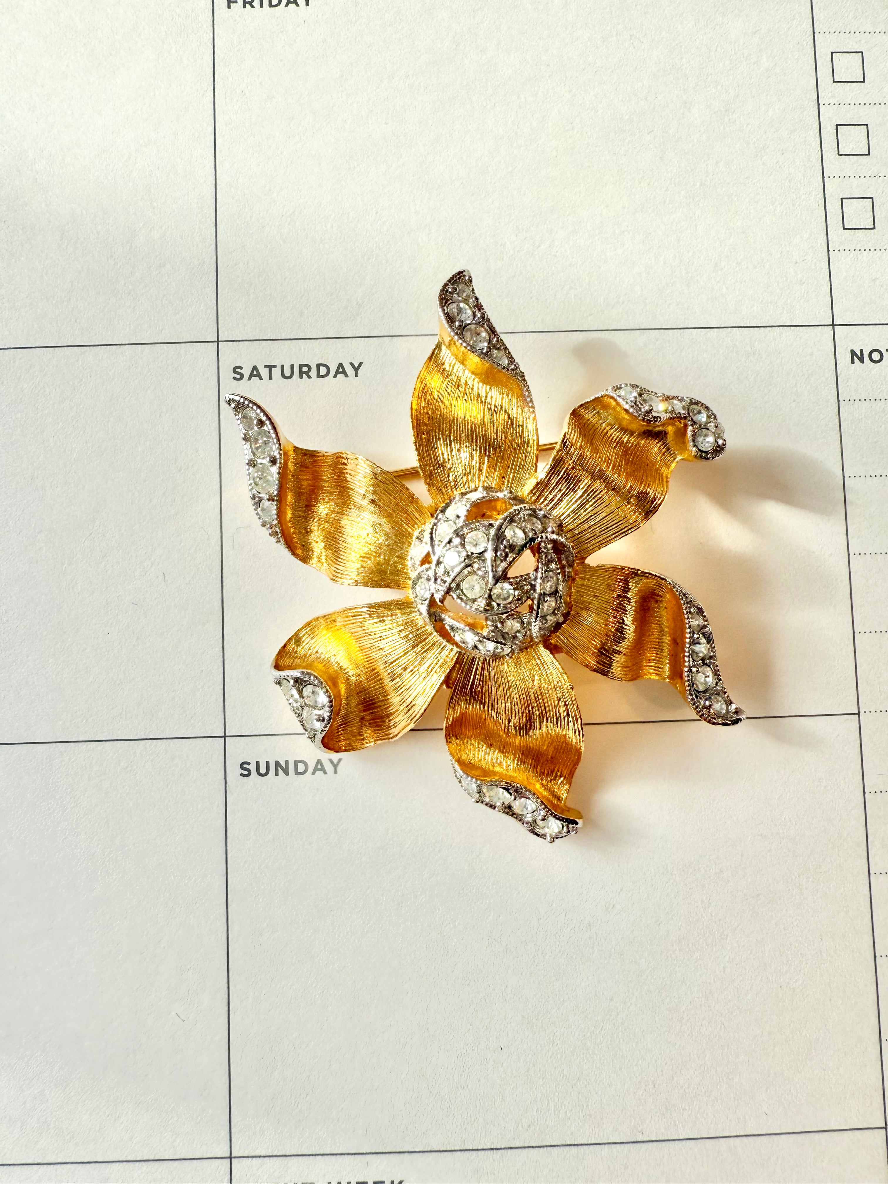 The most elegant gold and silver flower brooch....