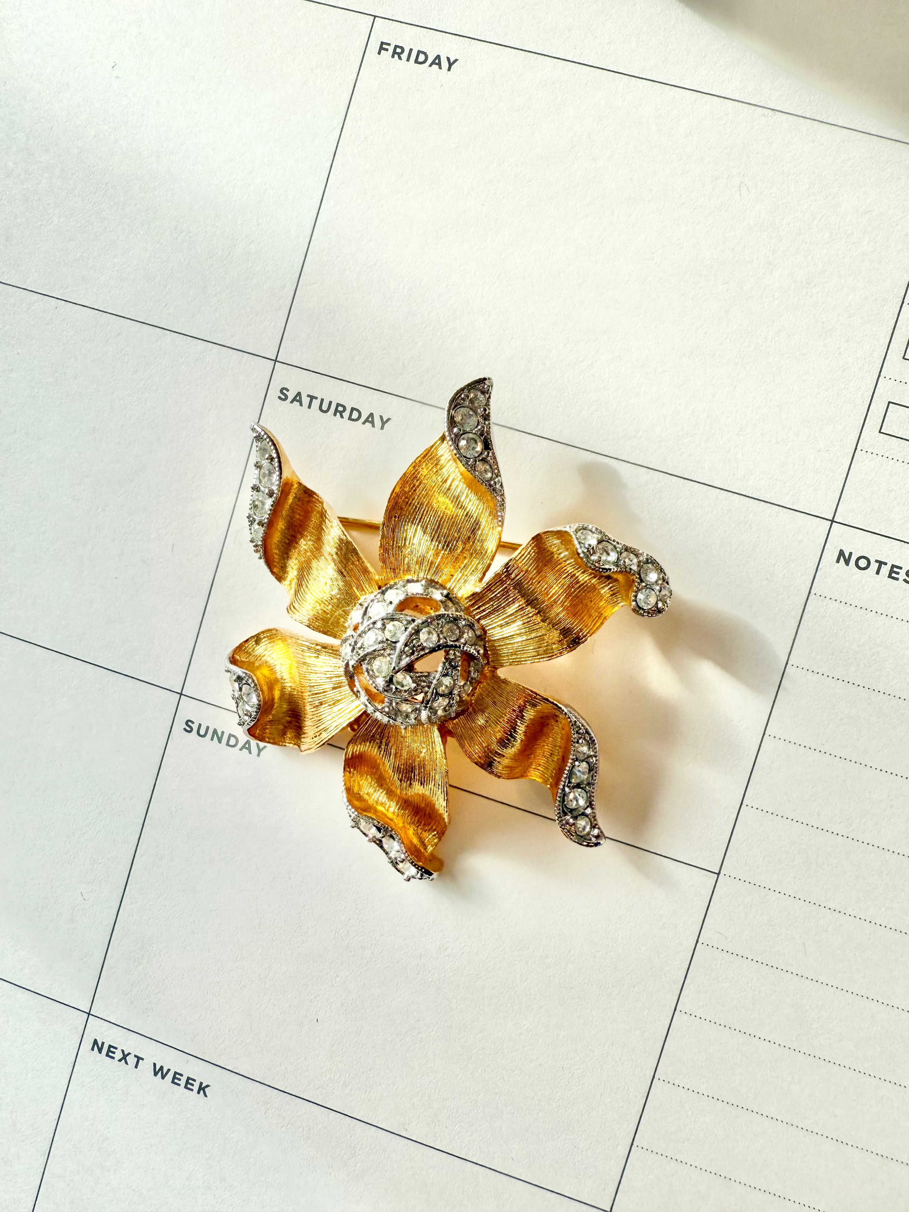 The most elegant gold and silver flower brooch....