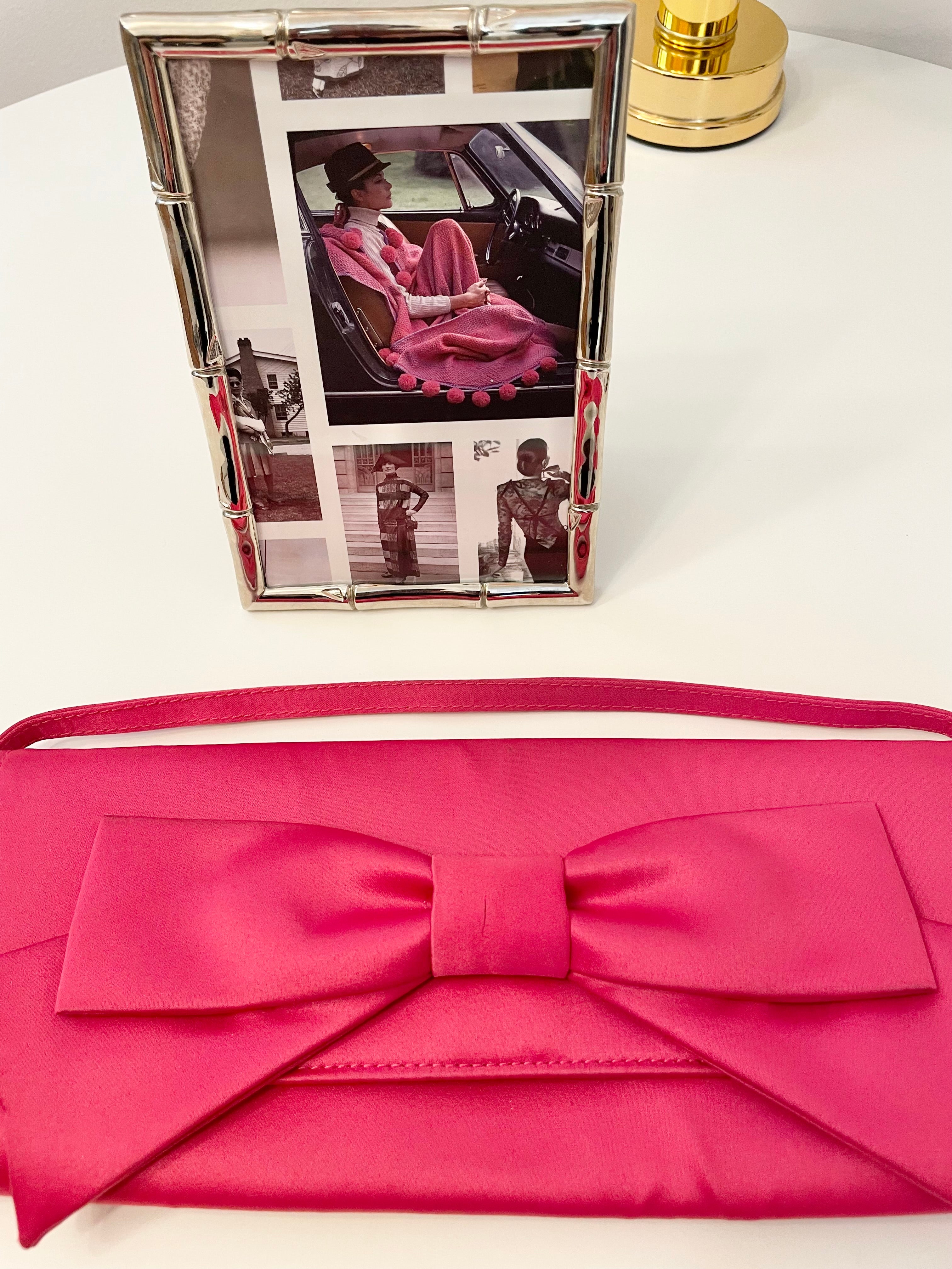 Flirty gal and her love of a classy pink bow bag!