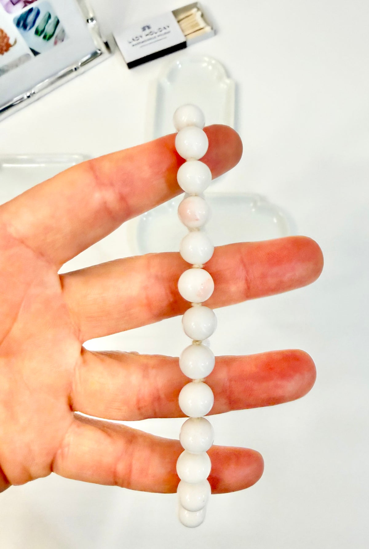 The most elegant faux angel skin coral glass necklace... so feminine