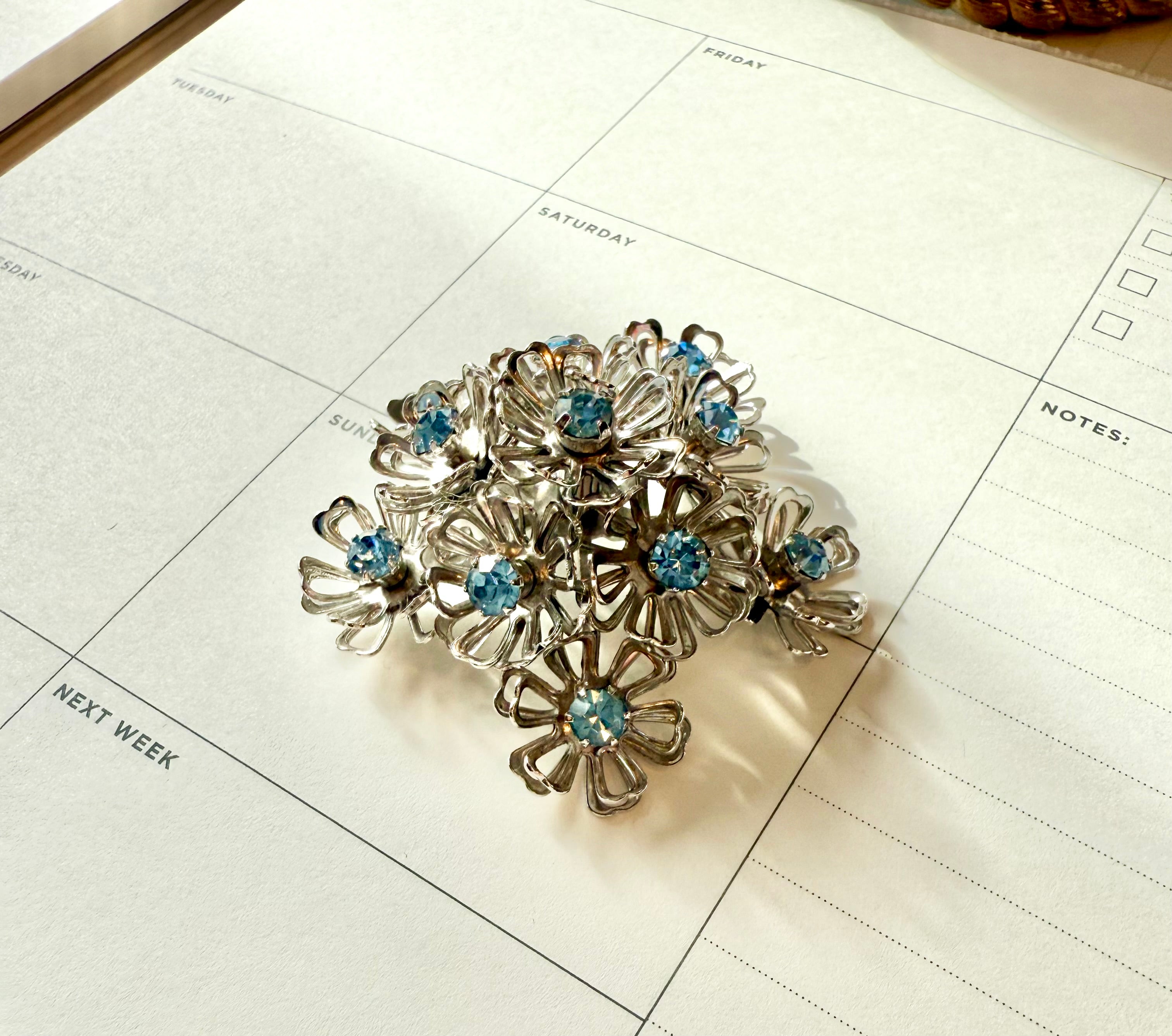 1950's Made In France darling silver and soft blue flower brooch....