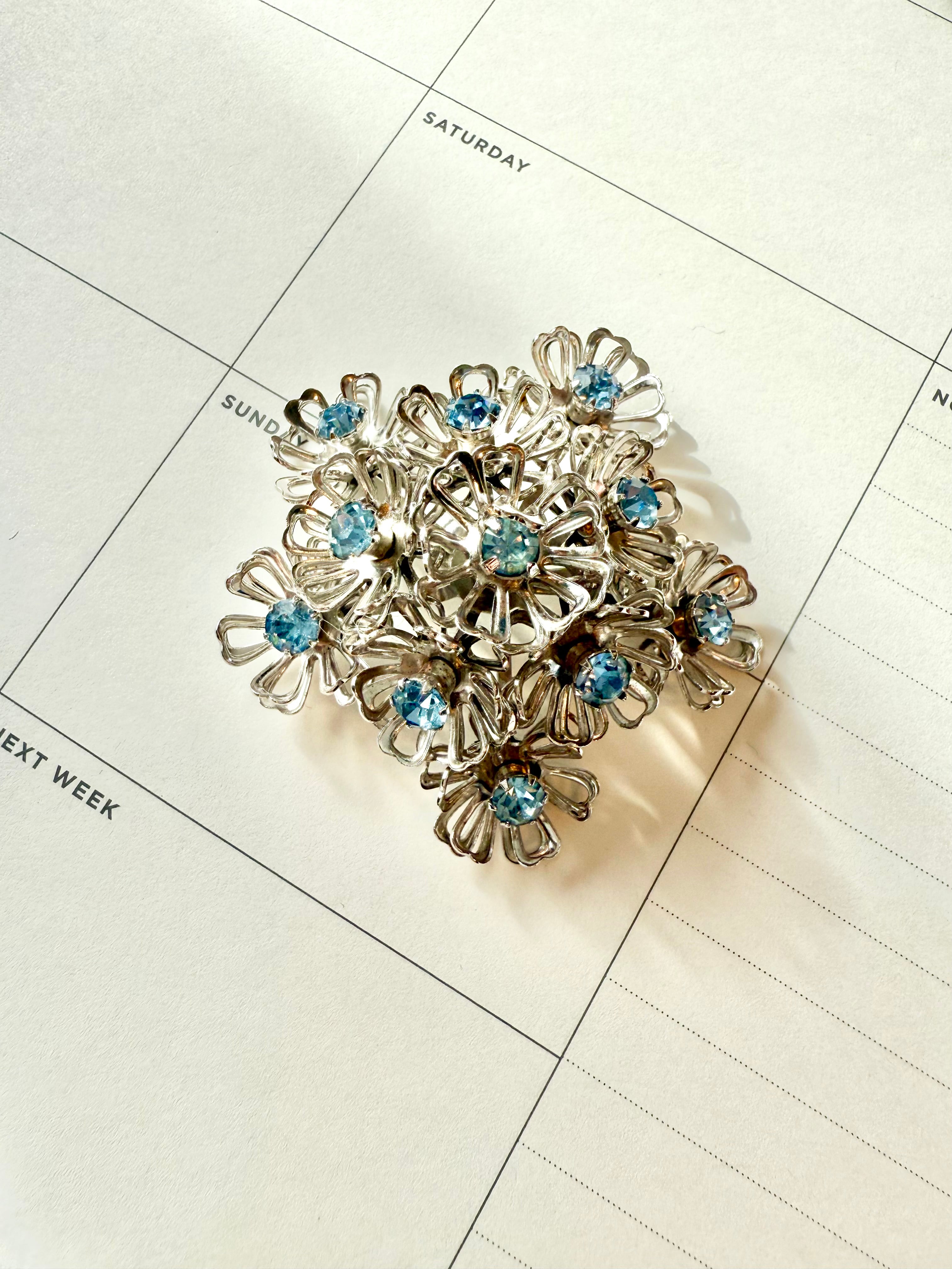 1950's Made In France darling silver and soft blue flower brooch....