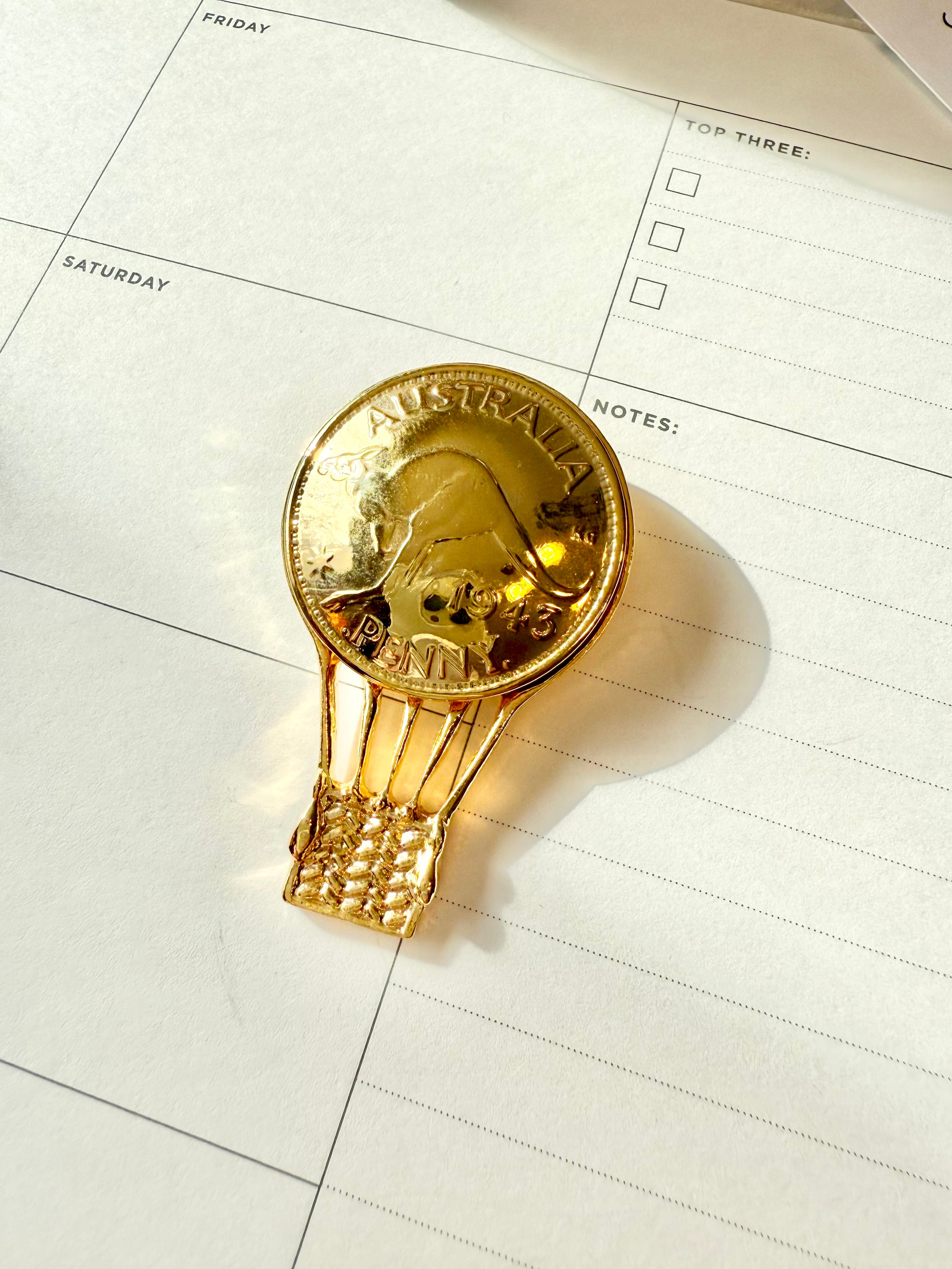 The most whimsical hot air ballon gold brooch... so elegant