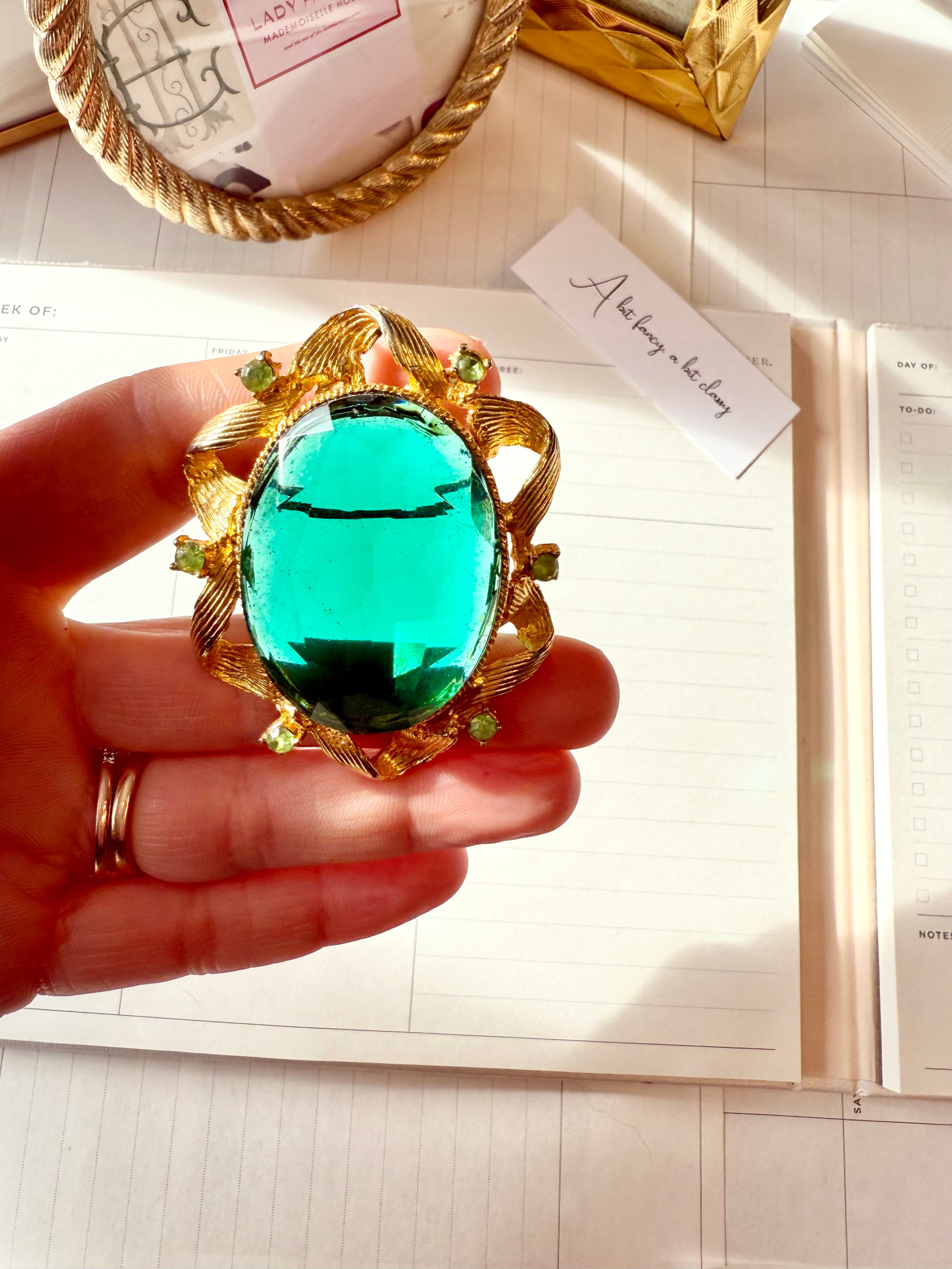 1960's divine emerald green glass brooch... so dramatic