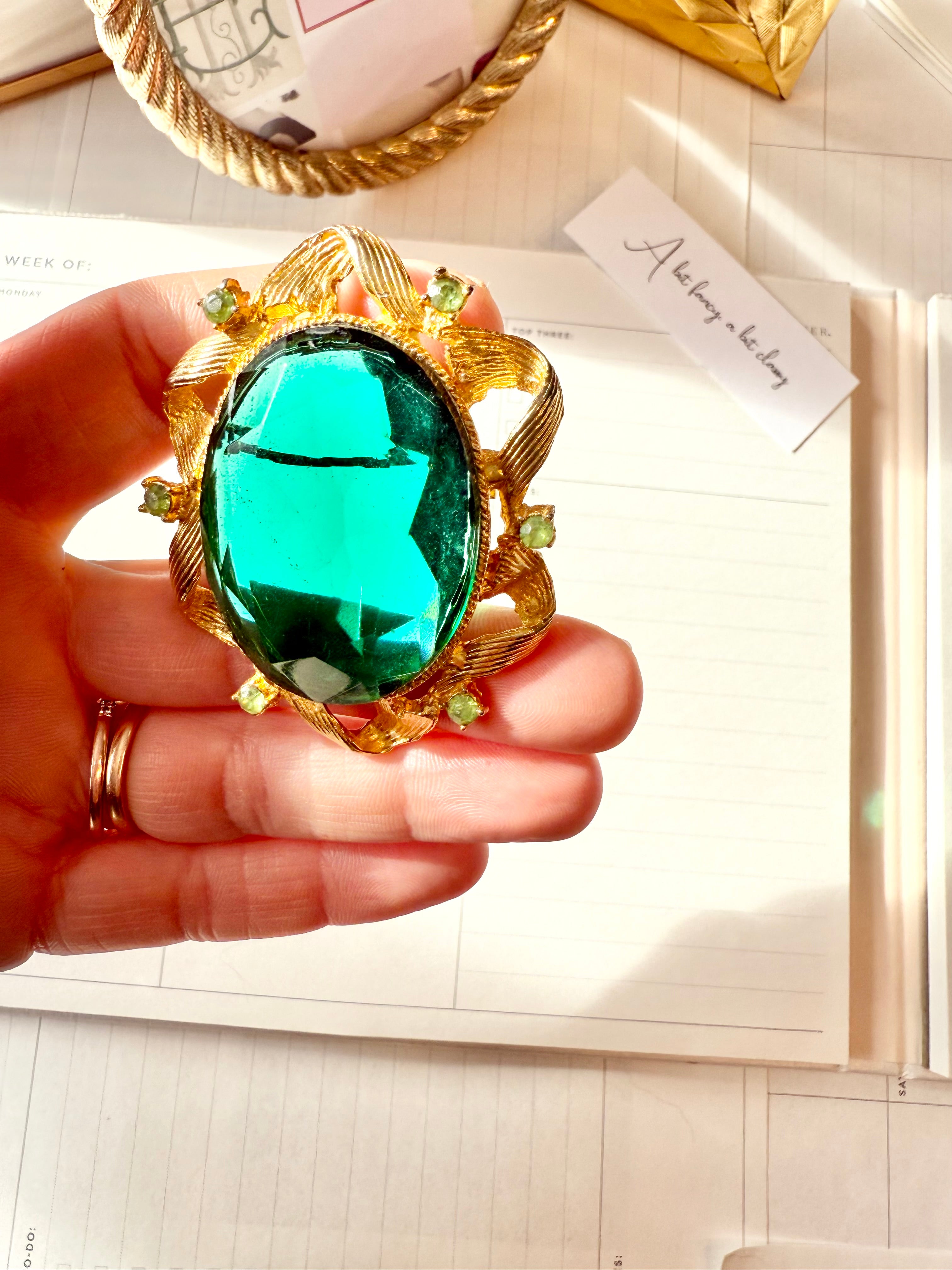 1960's divine emerald green glass brooch... so dramatic