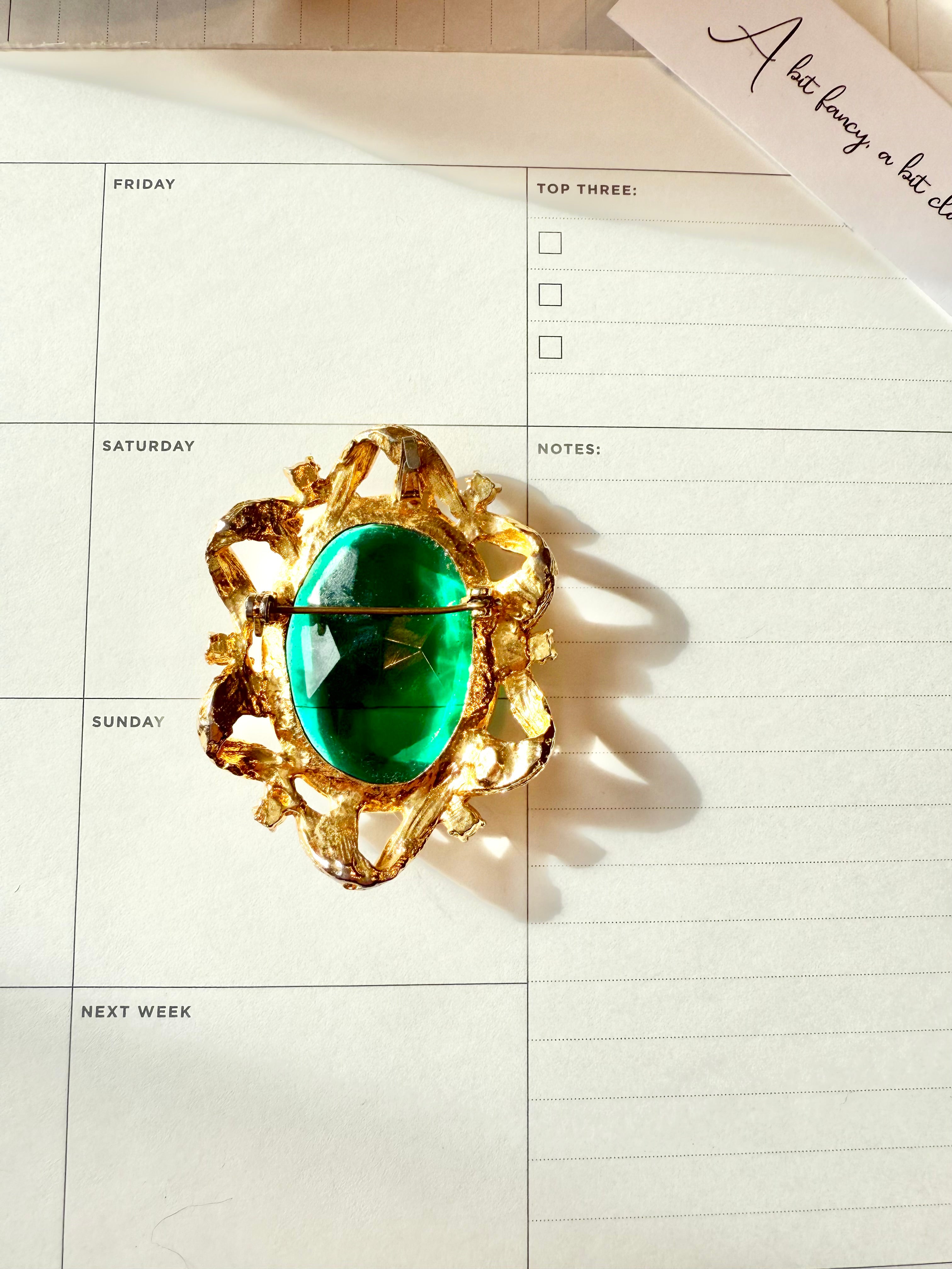 1960's divine emerald green glass brooch... so dramatic