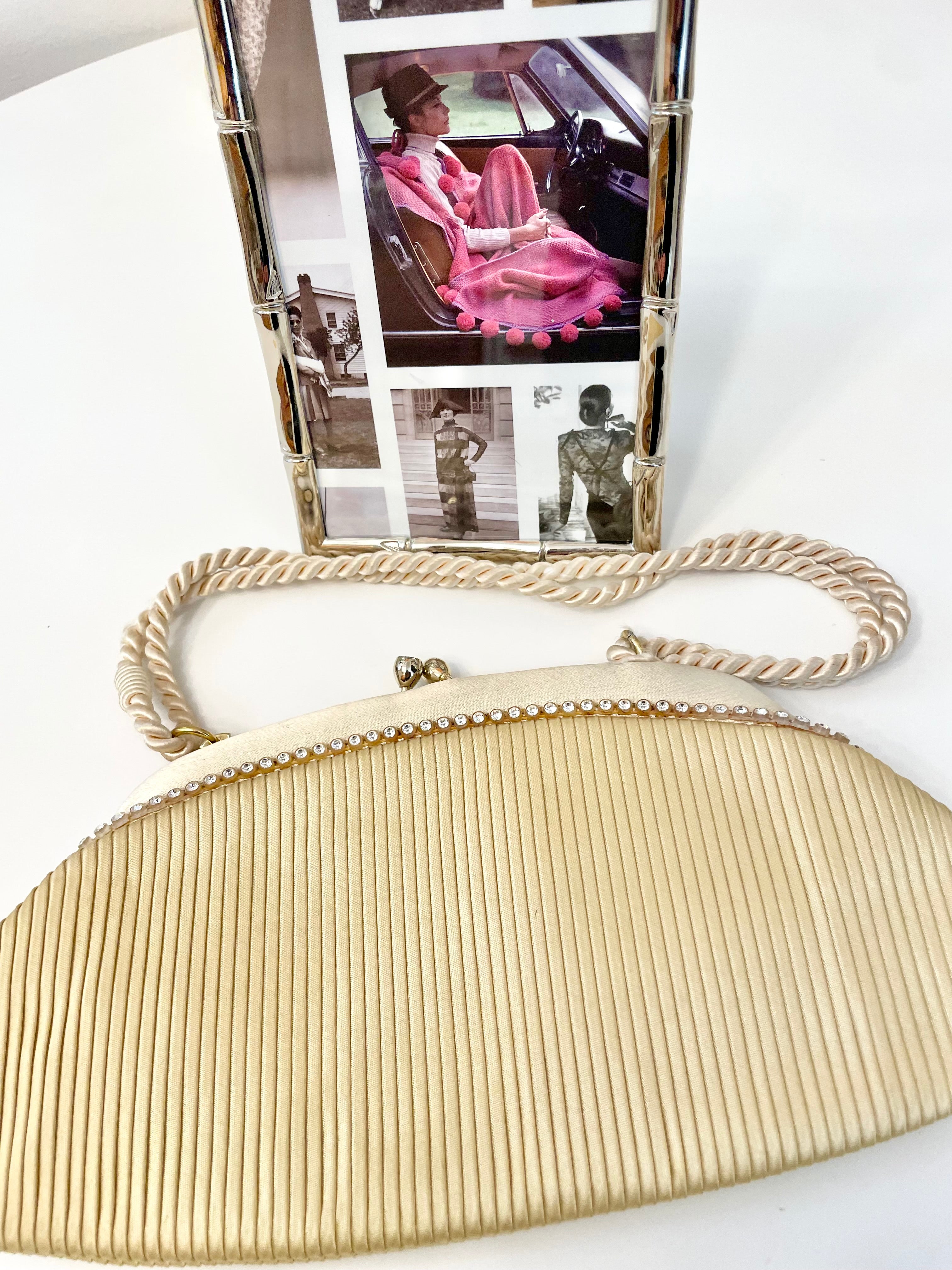 The most lovely ivory satin pleated evening bag.... so chic