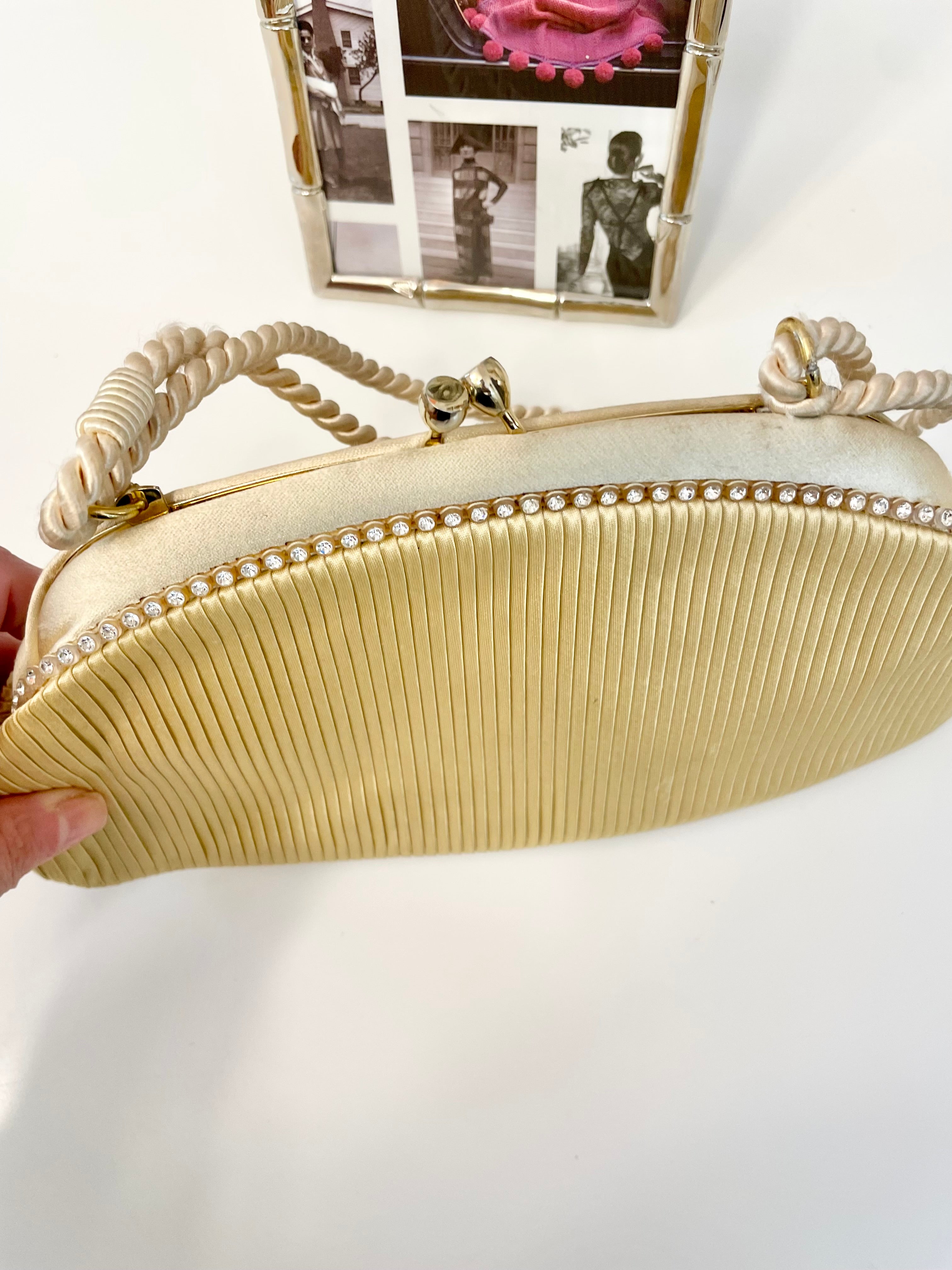 The most lovely ivory satin pleated evening bag.... so chic