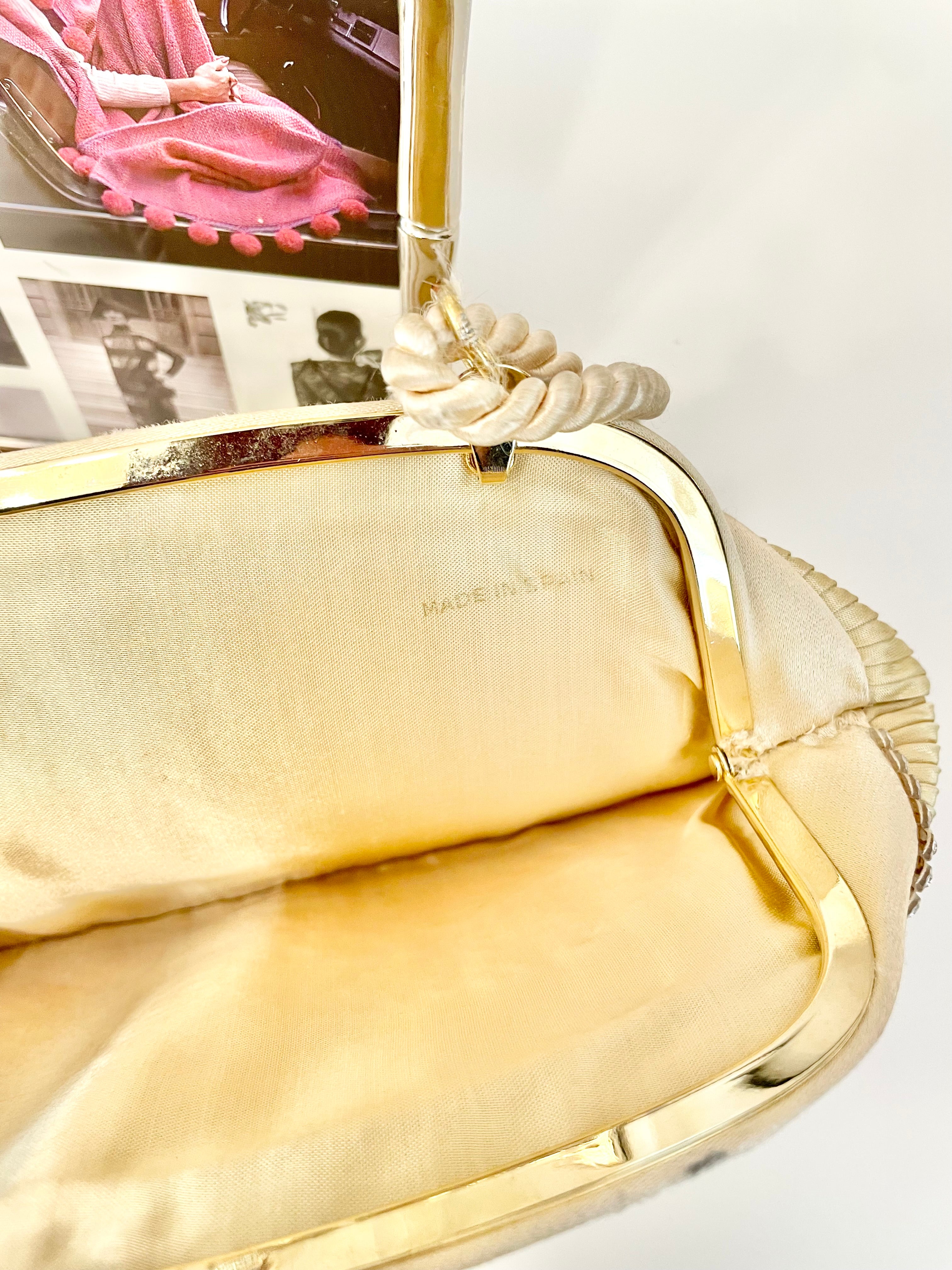 The most lovely ivory satin pleated evening bag.... so chic