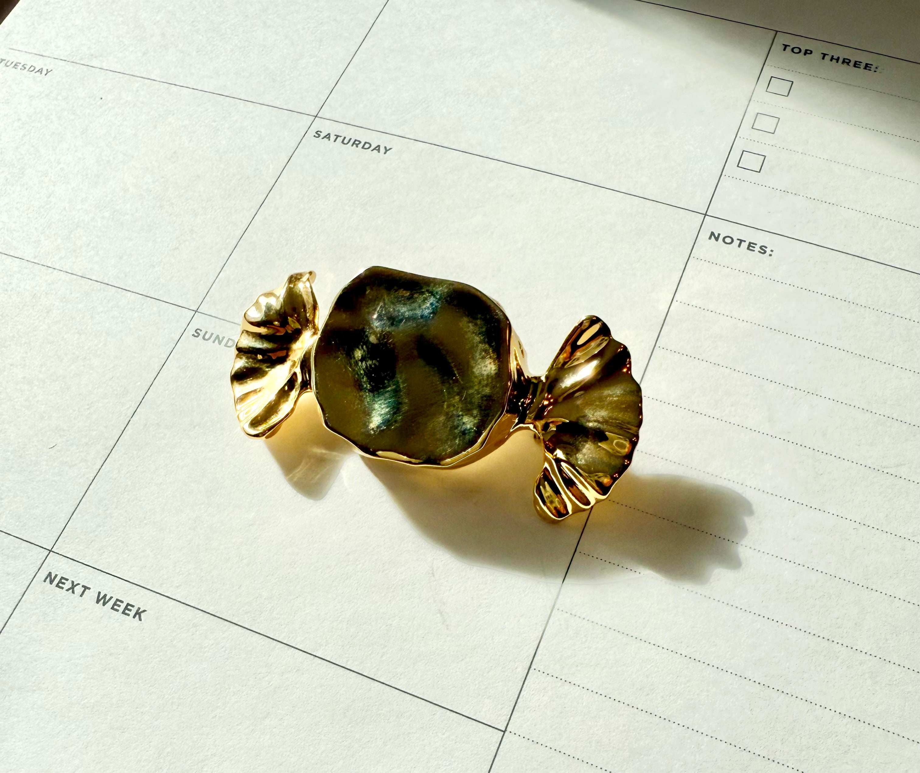 The most charming preppy gold candy brooch... perfect!