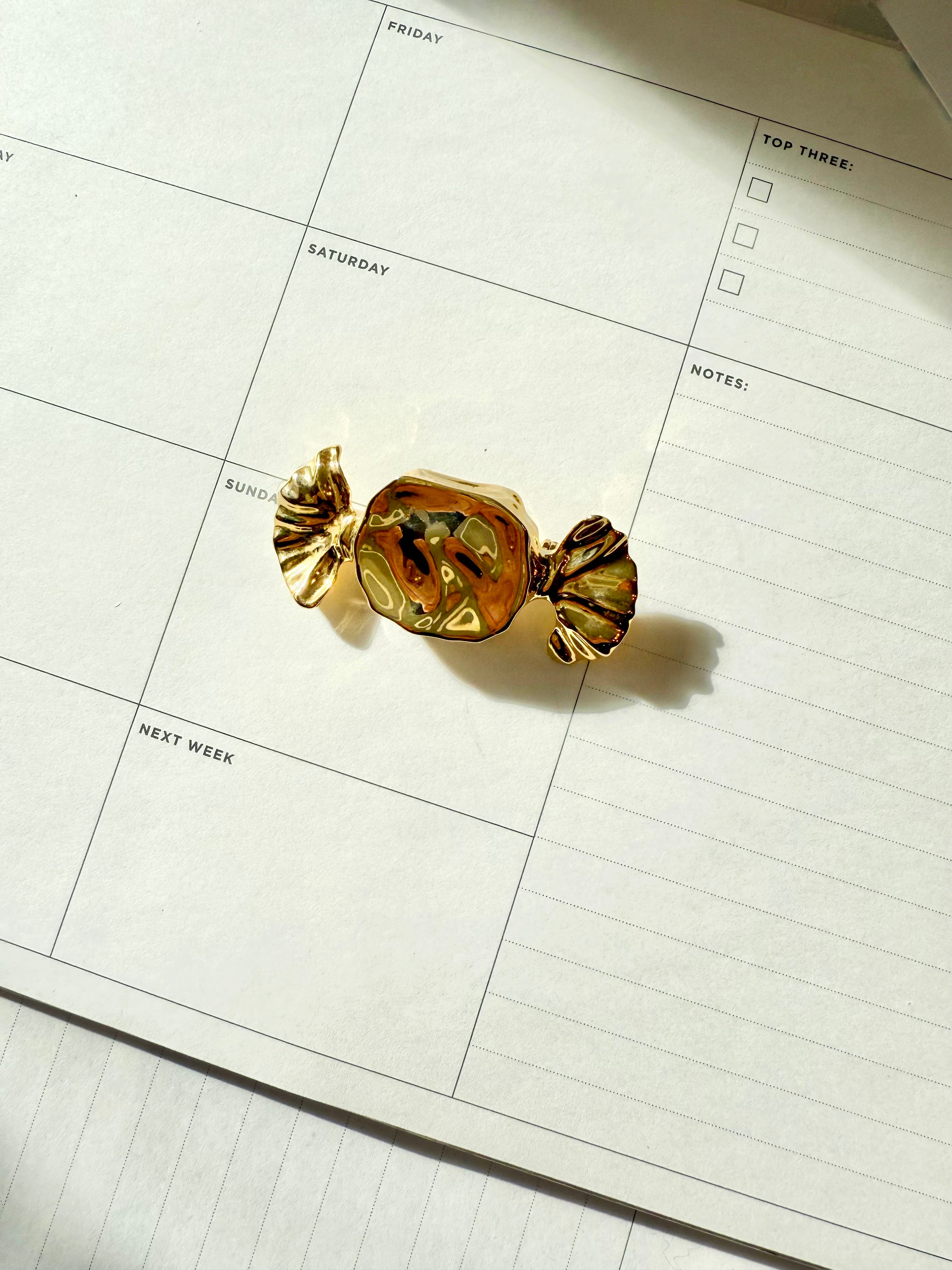 The most charming preppy gold candy brooch... perfect!