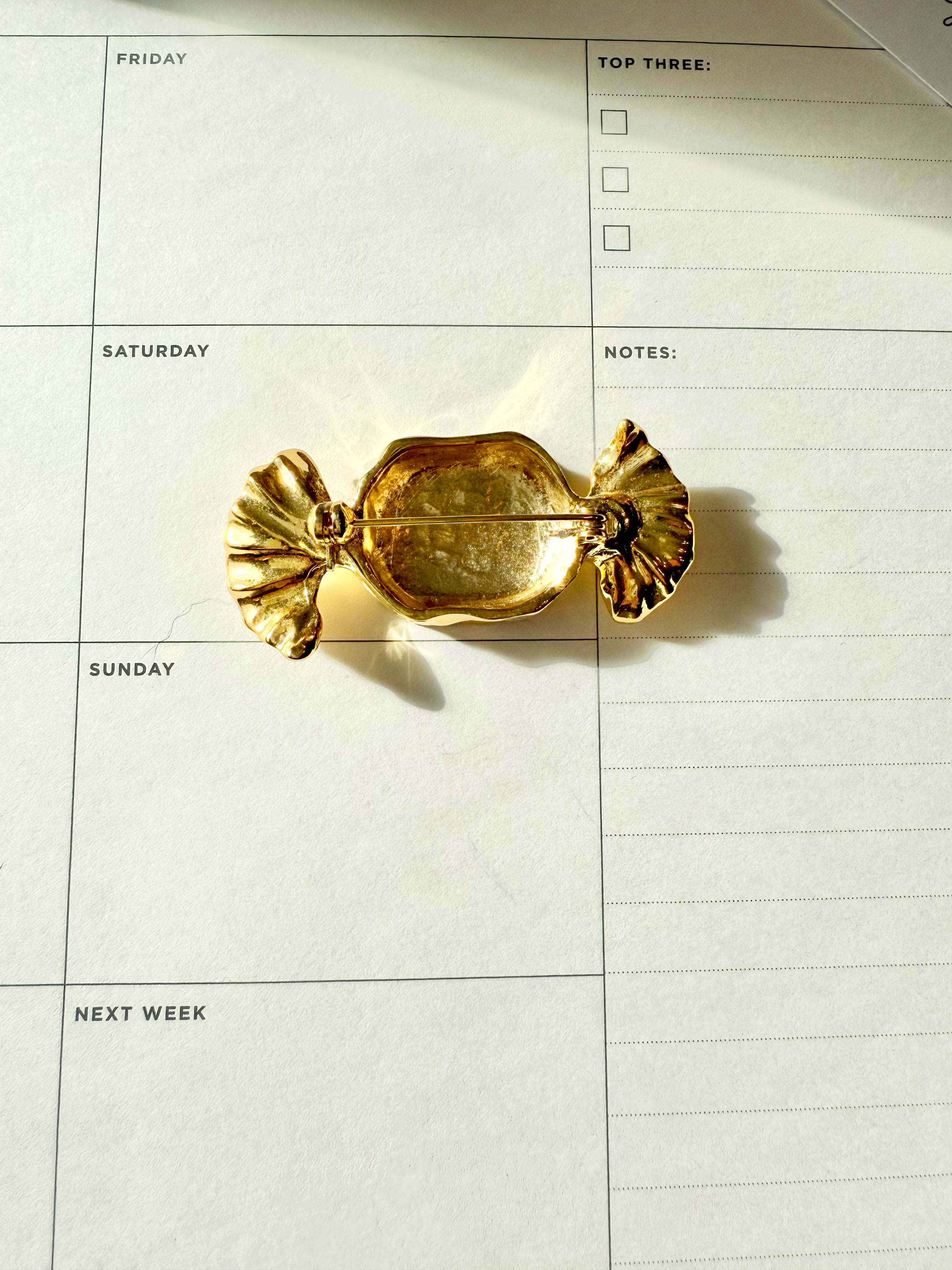 The most charming preppy gold candy brooch... perfect!