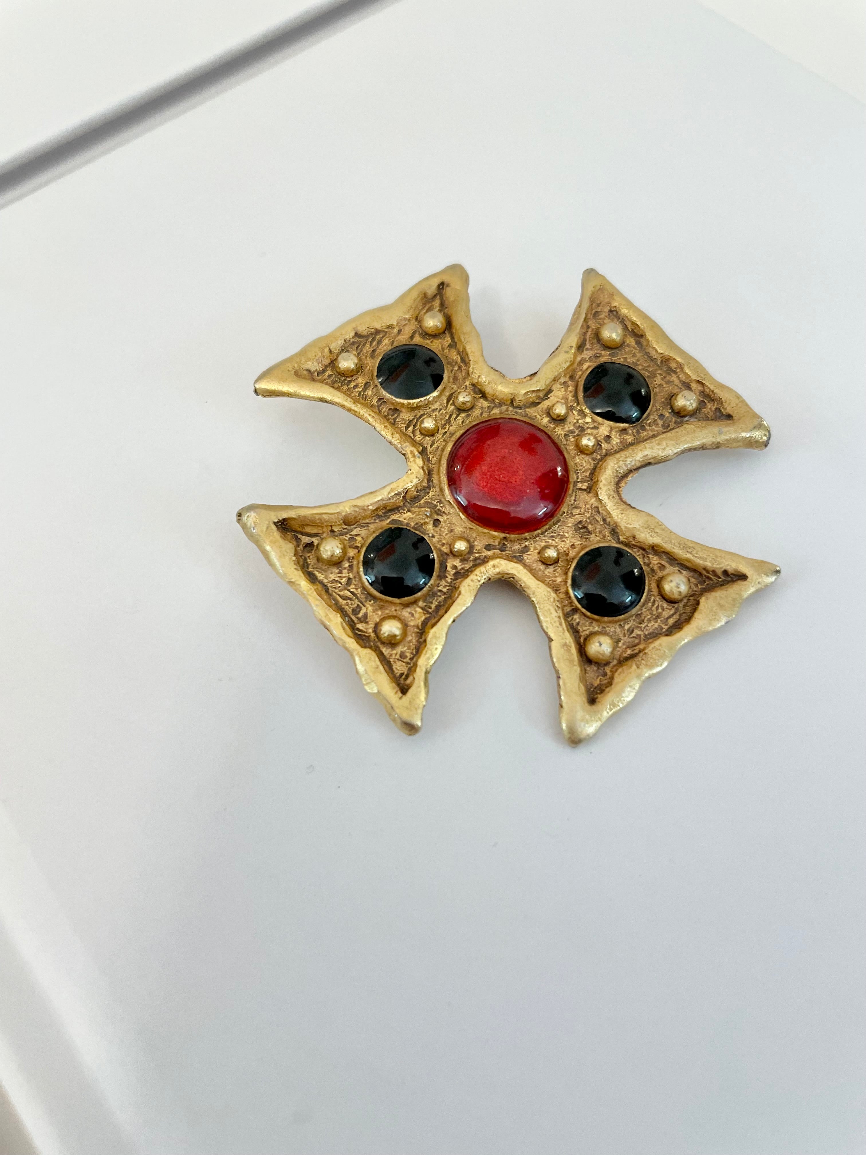 1970's super chic matte gold Maltese cross with red, and black enamel details.