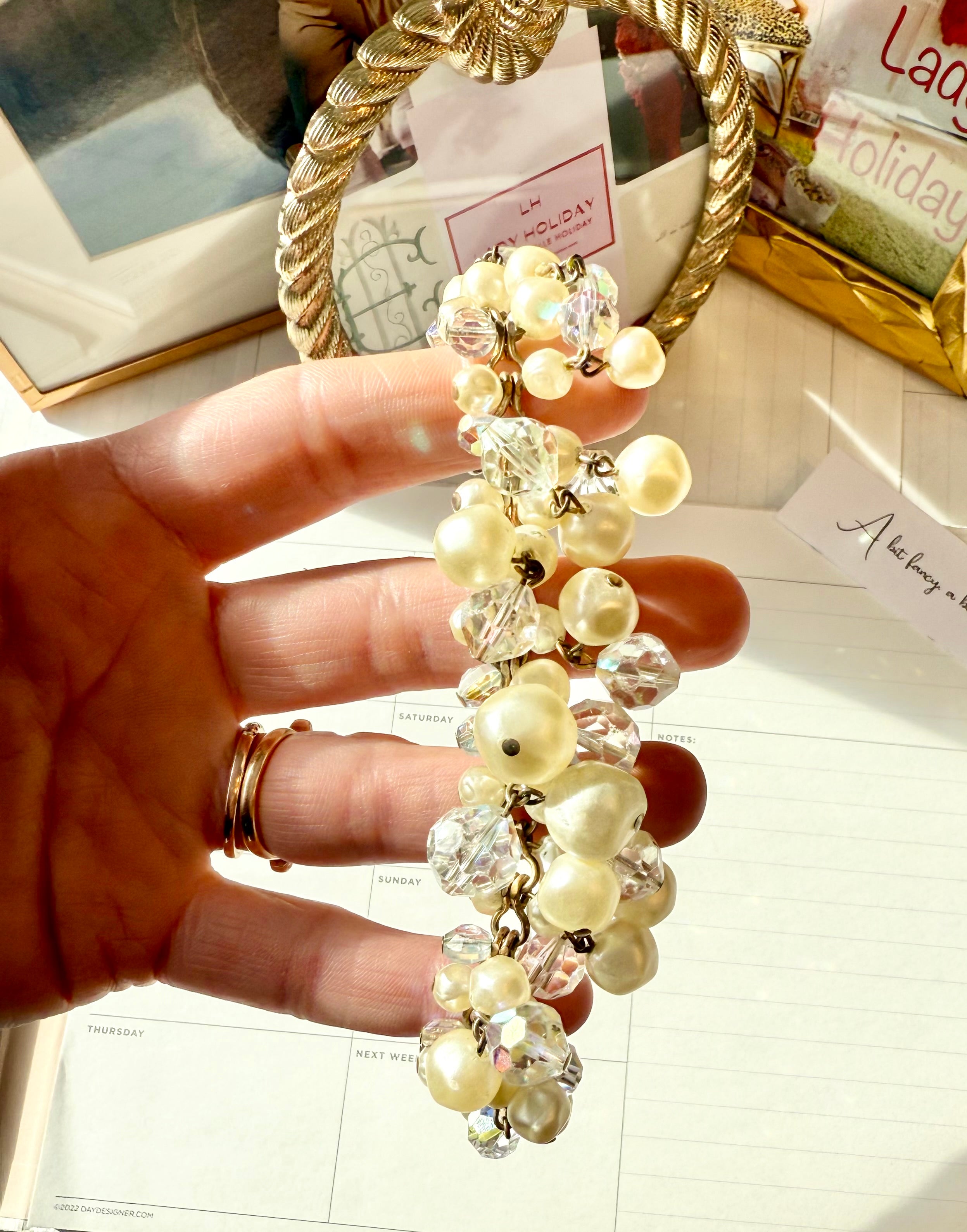 The most darling pearl, and glass charm bracelet... so chic