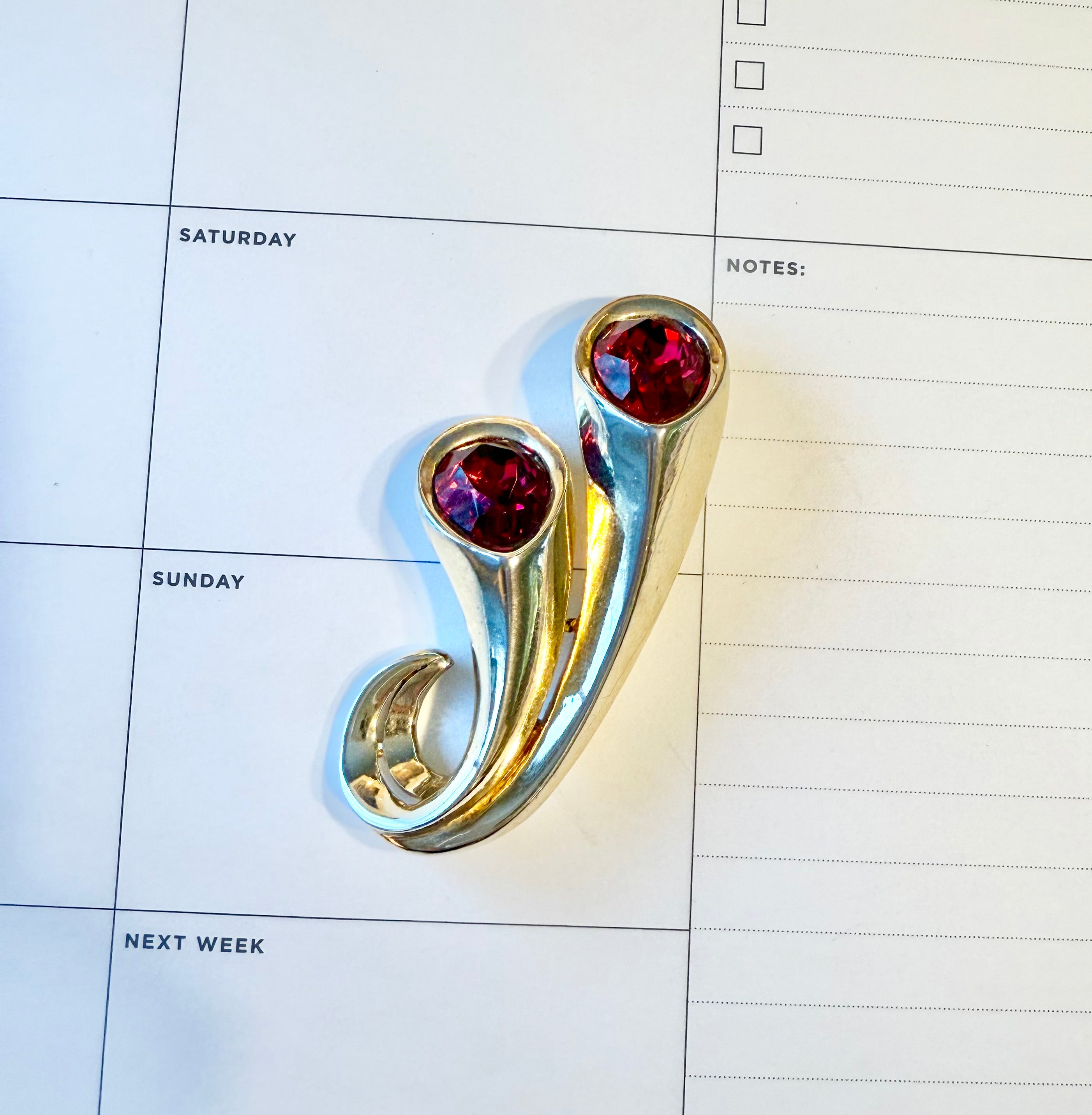 The most elegant Coro ruby glass brooch.... so divine