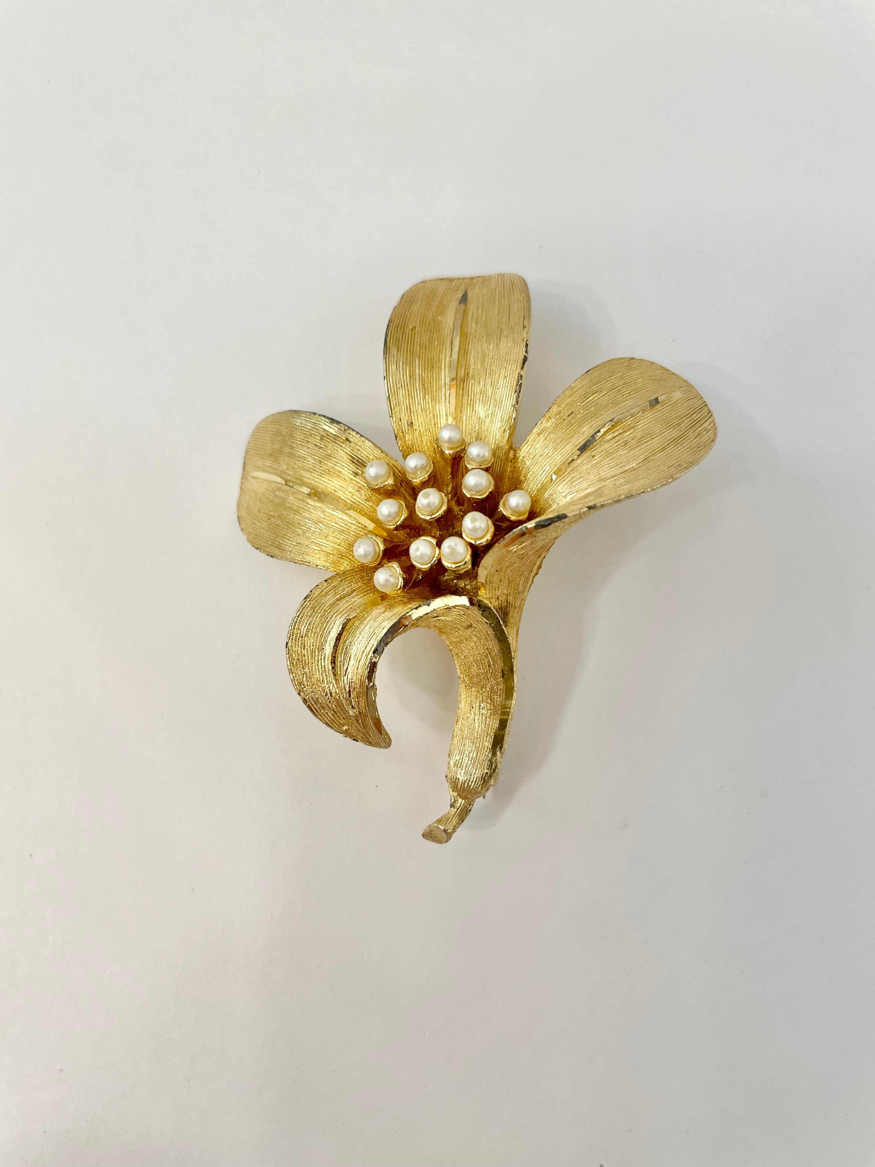 Isn't she charming... adores anything with pearls! This divine gold sculpted lily brooch is outstanding.