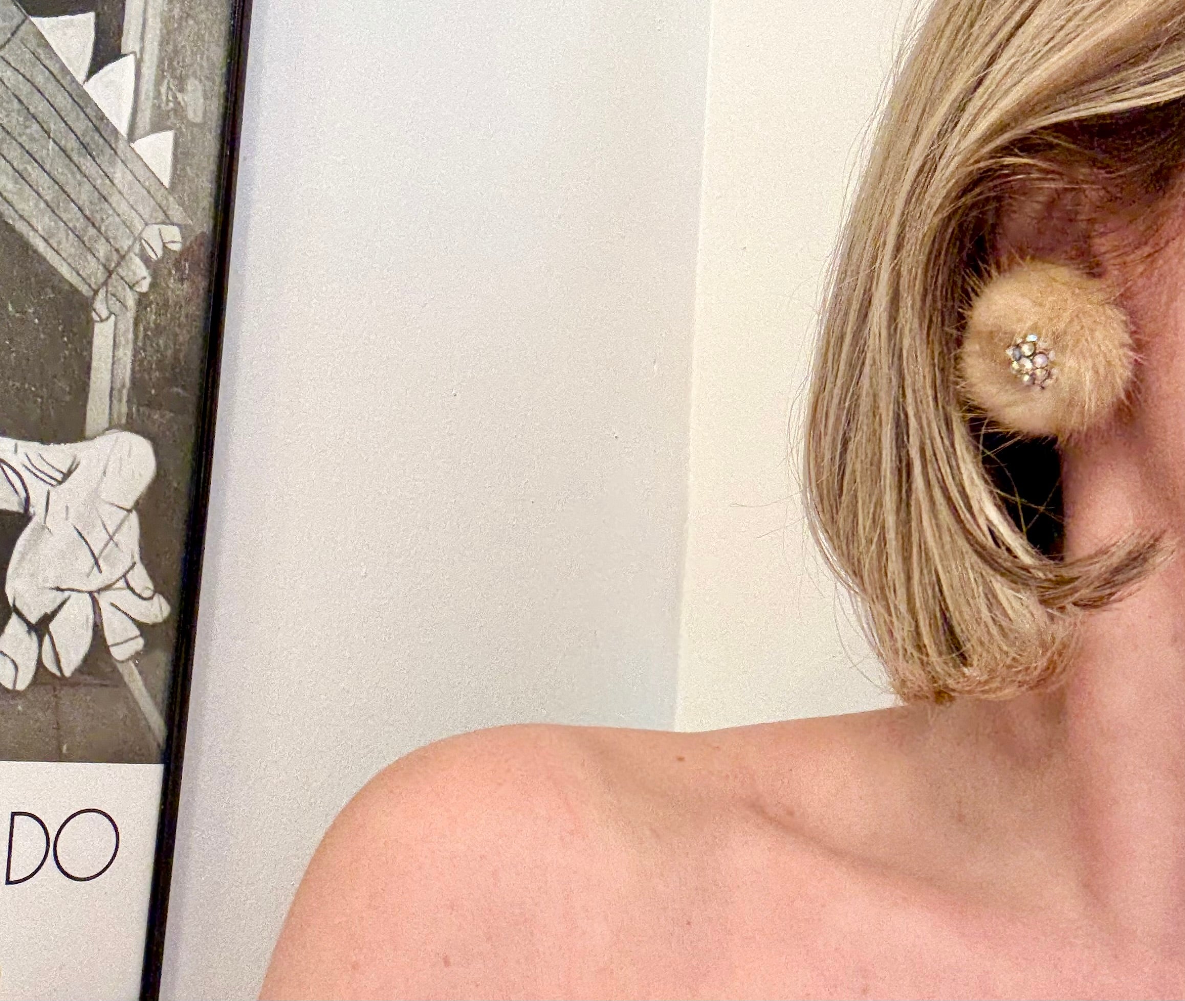 The mink button earring....