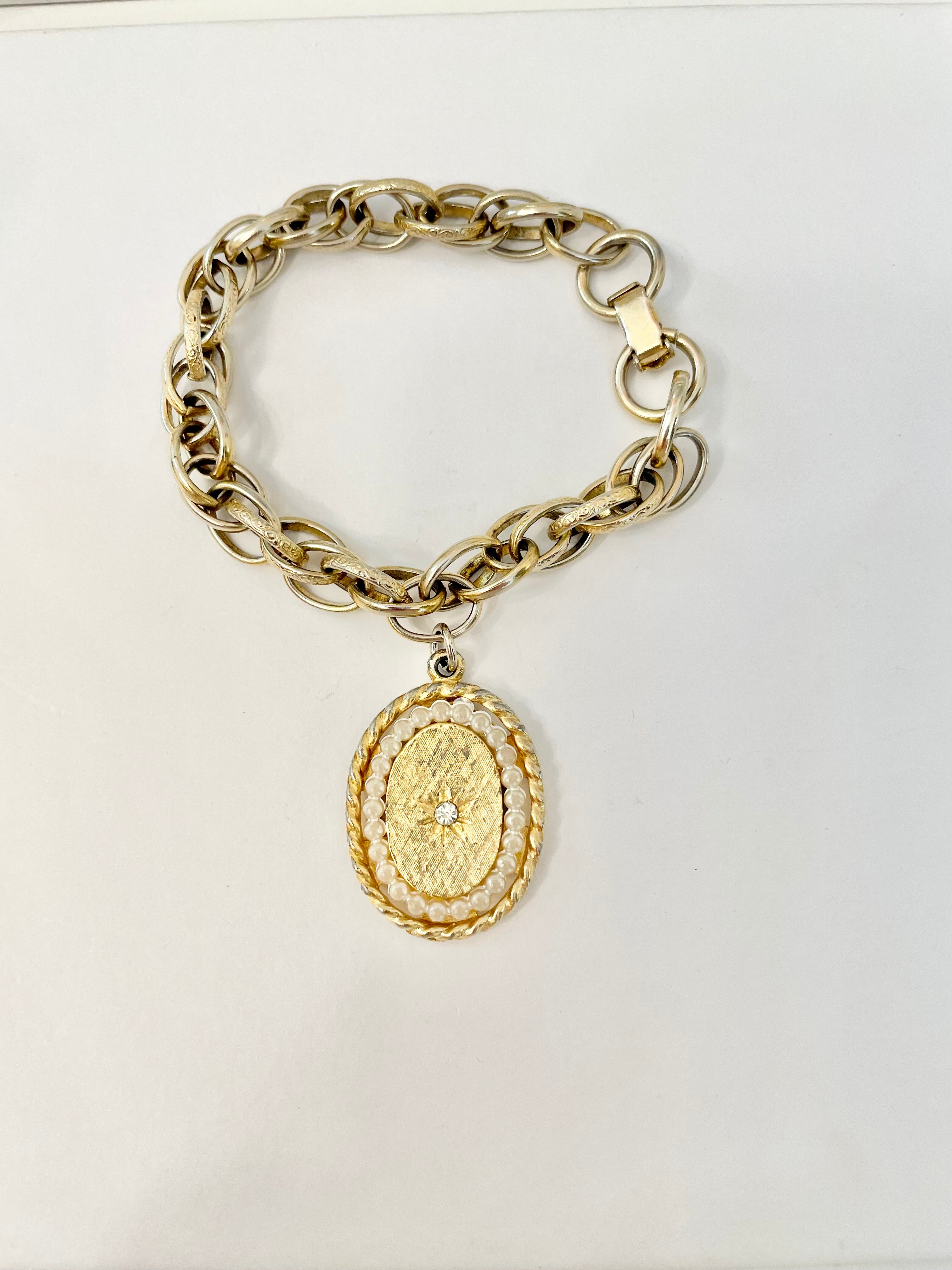 1960's truly divine charming bracelet....So classy!