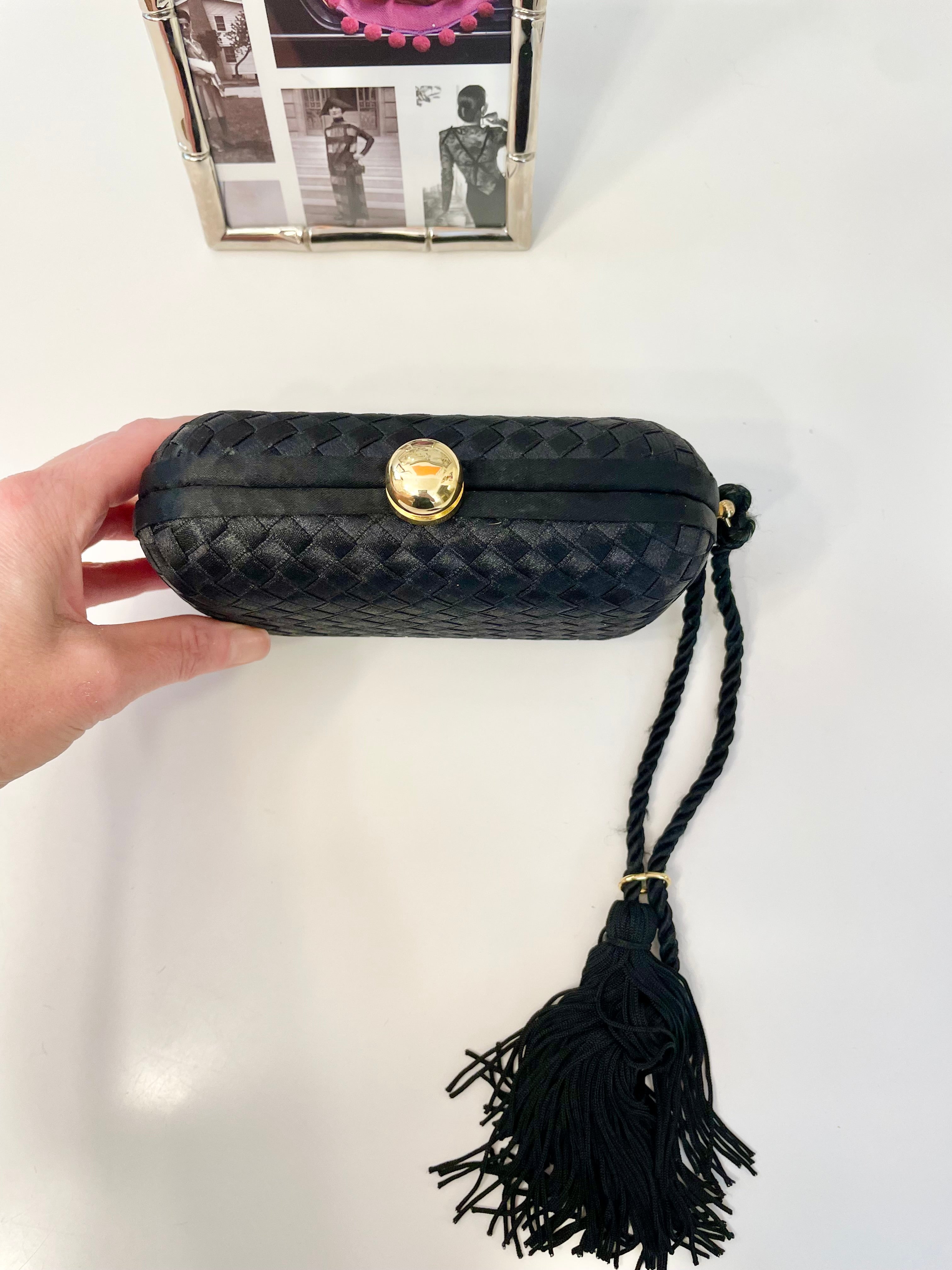 La Regale stunning 1970 s hard case divine clutch bag with tassel details