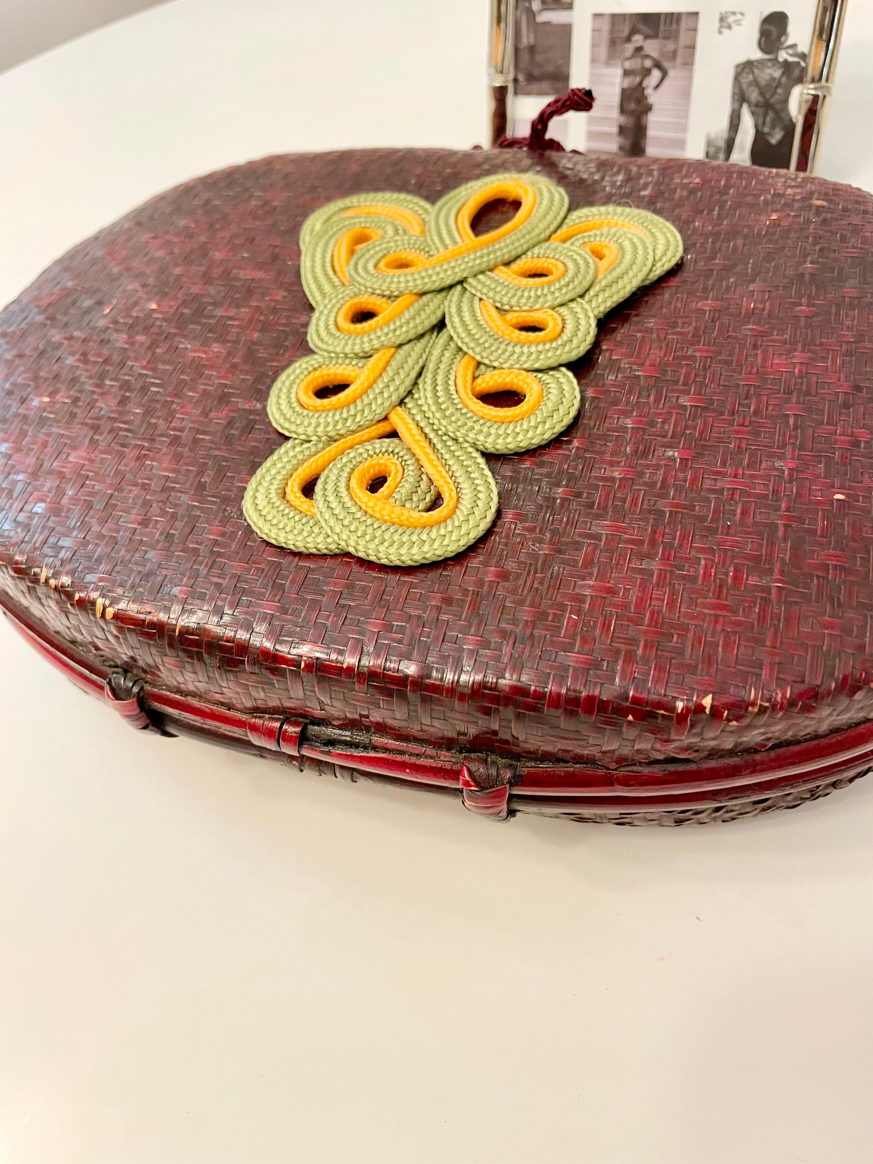 1950's French wicker clutch bag with sassy adornment..