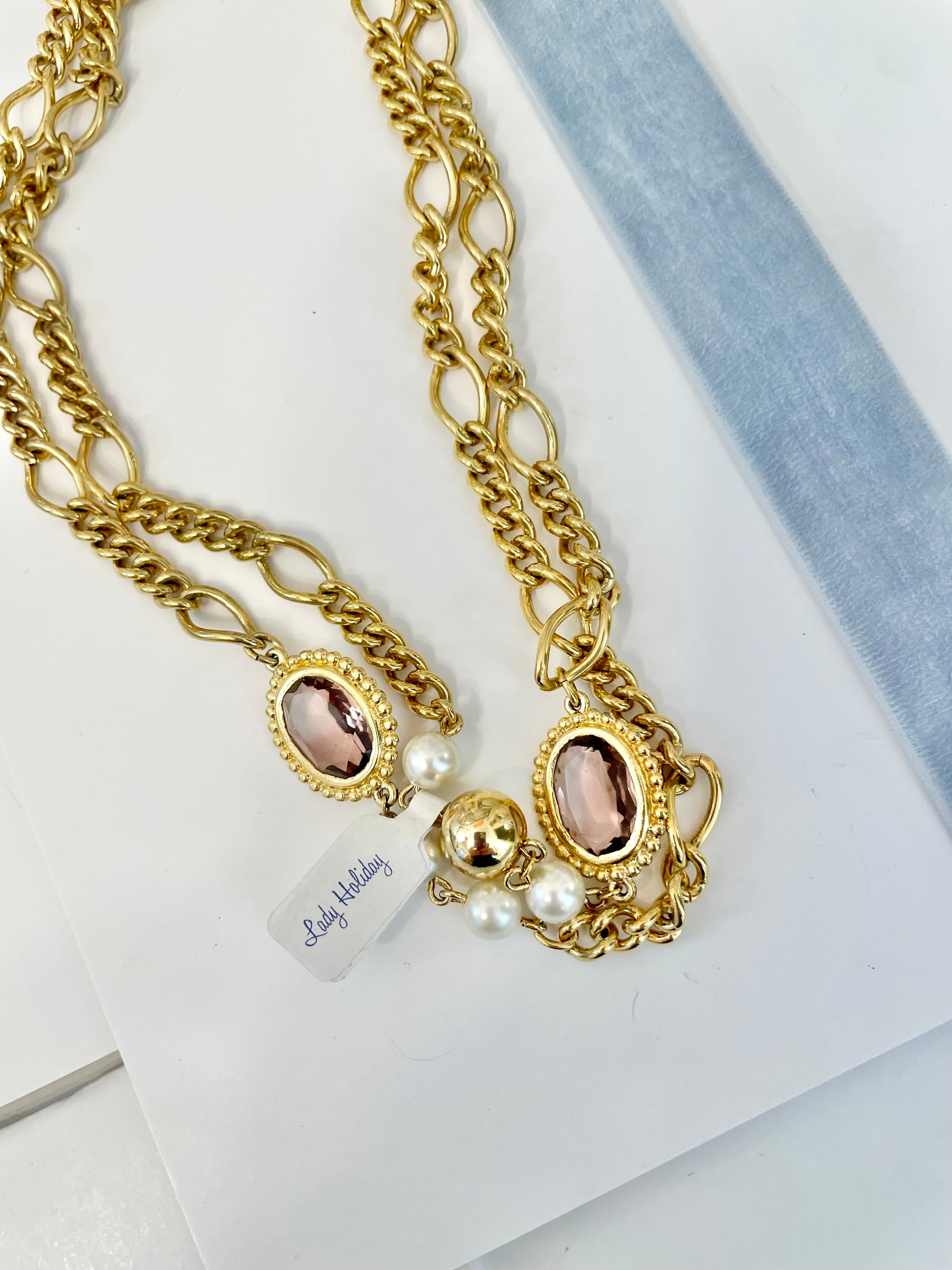 1970's gold chain runway necklace that is dusted with pearls and purple glass stones! So charming