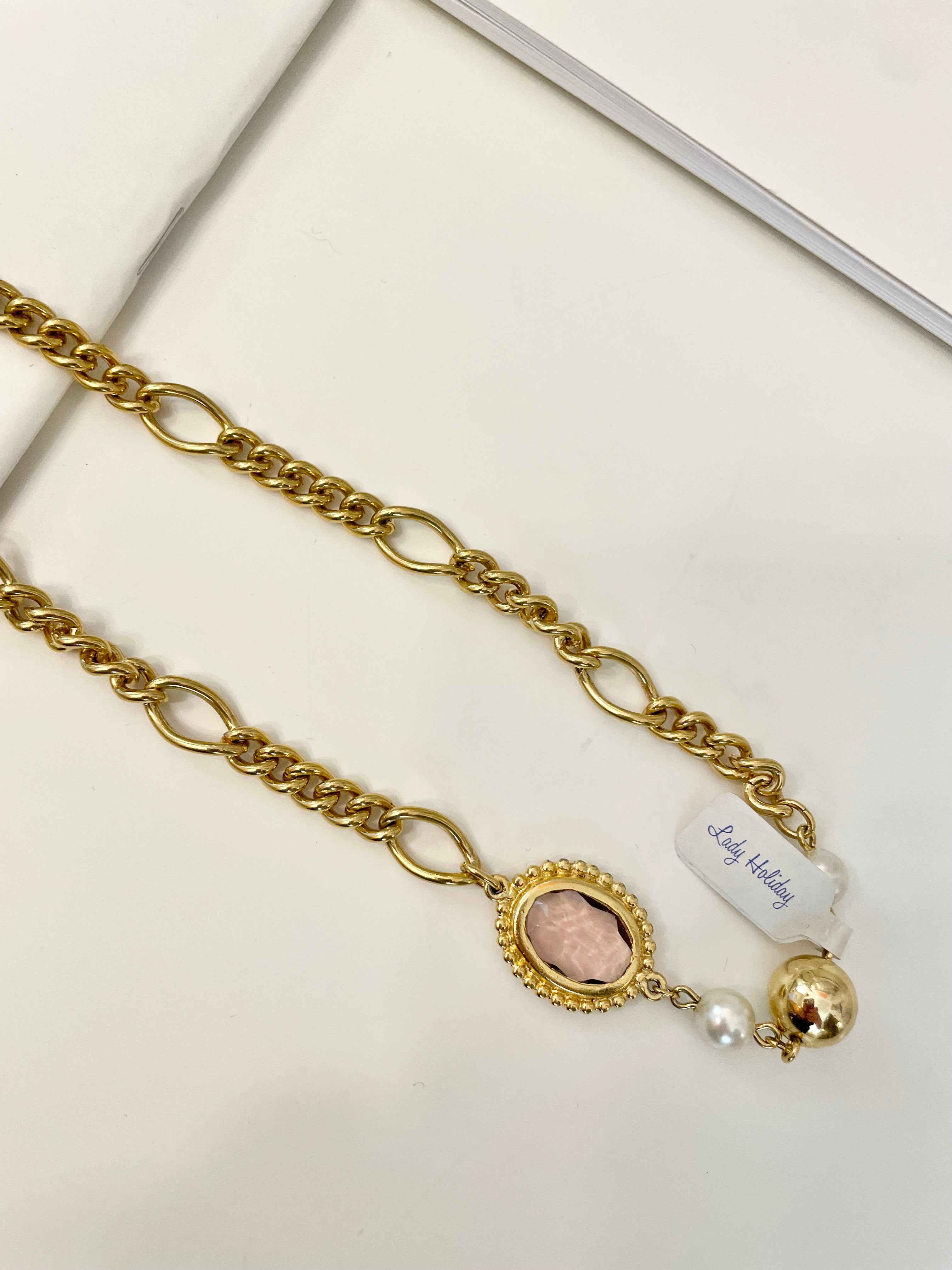 1970's gold chain runway necklace that is dusted with pearls and purple glass stones! So charming