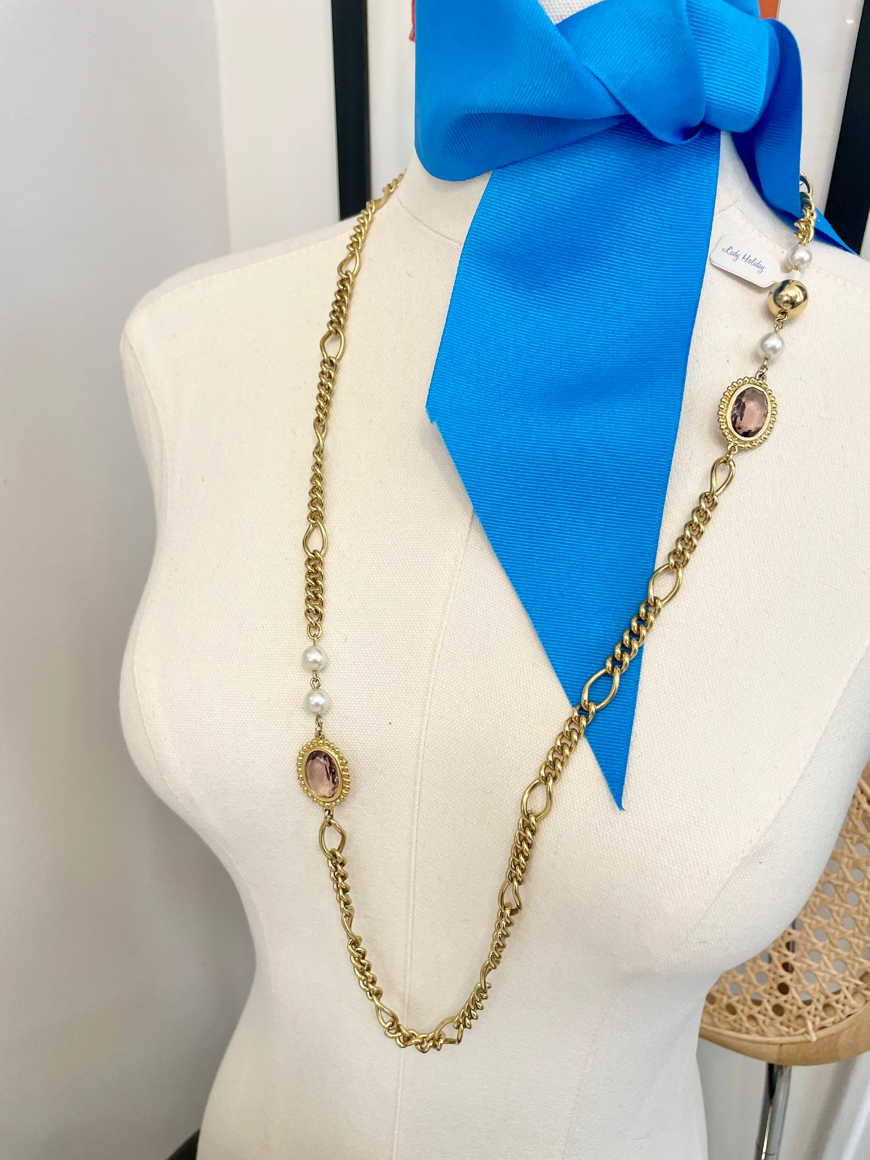 1970's gold chain runway necklace that is dusted with pearls and purple glass stones! So charming