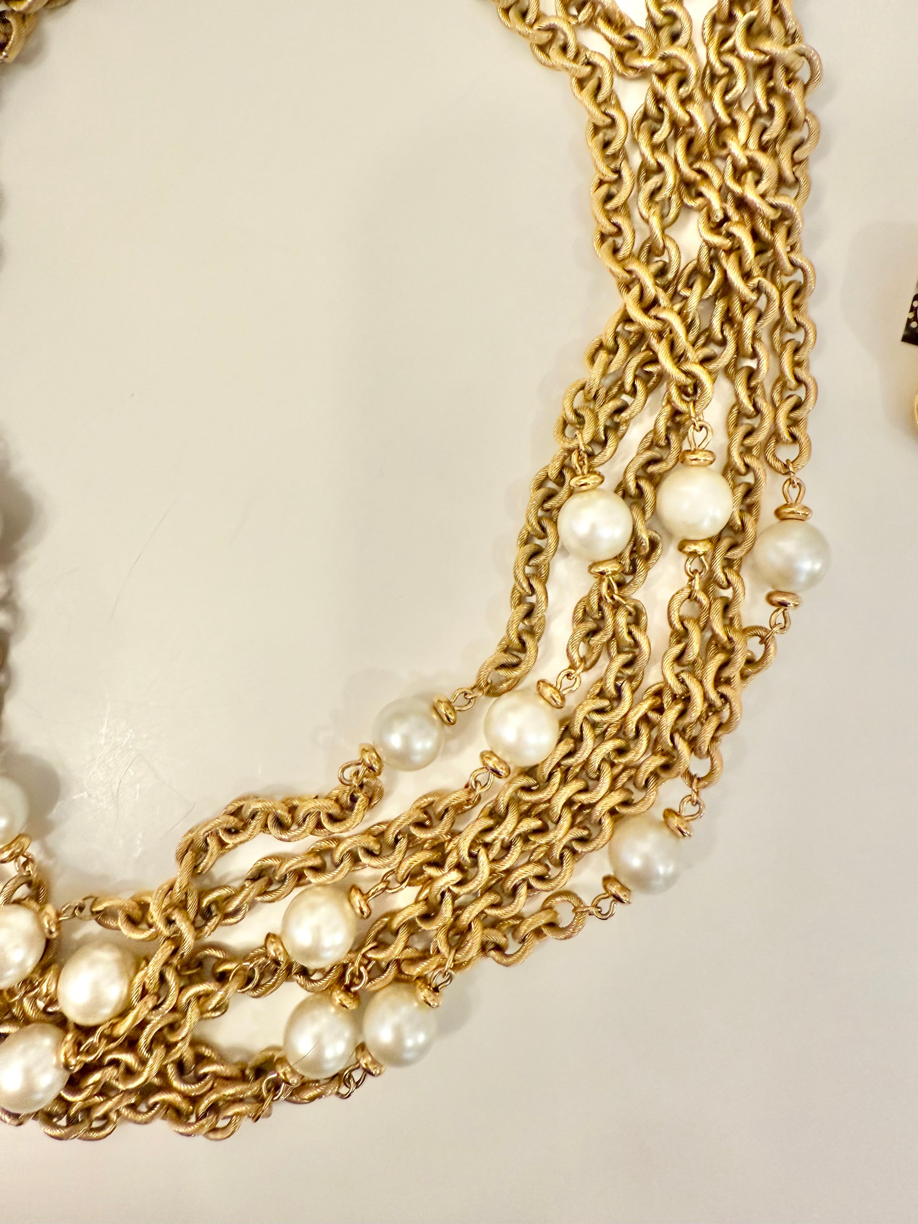 The charming gold chain and pearl necklace by Napier.