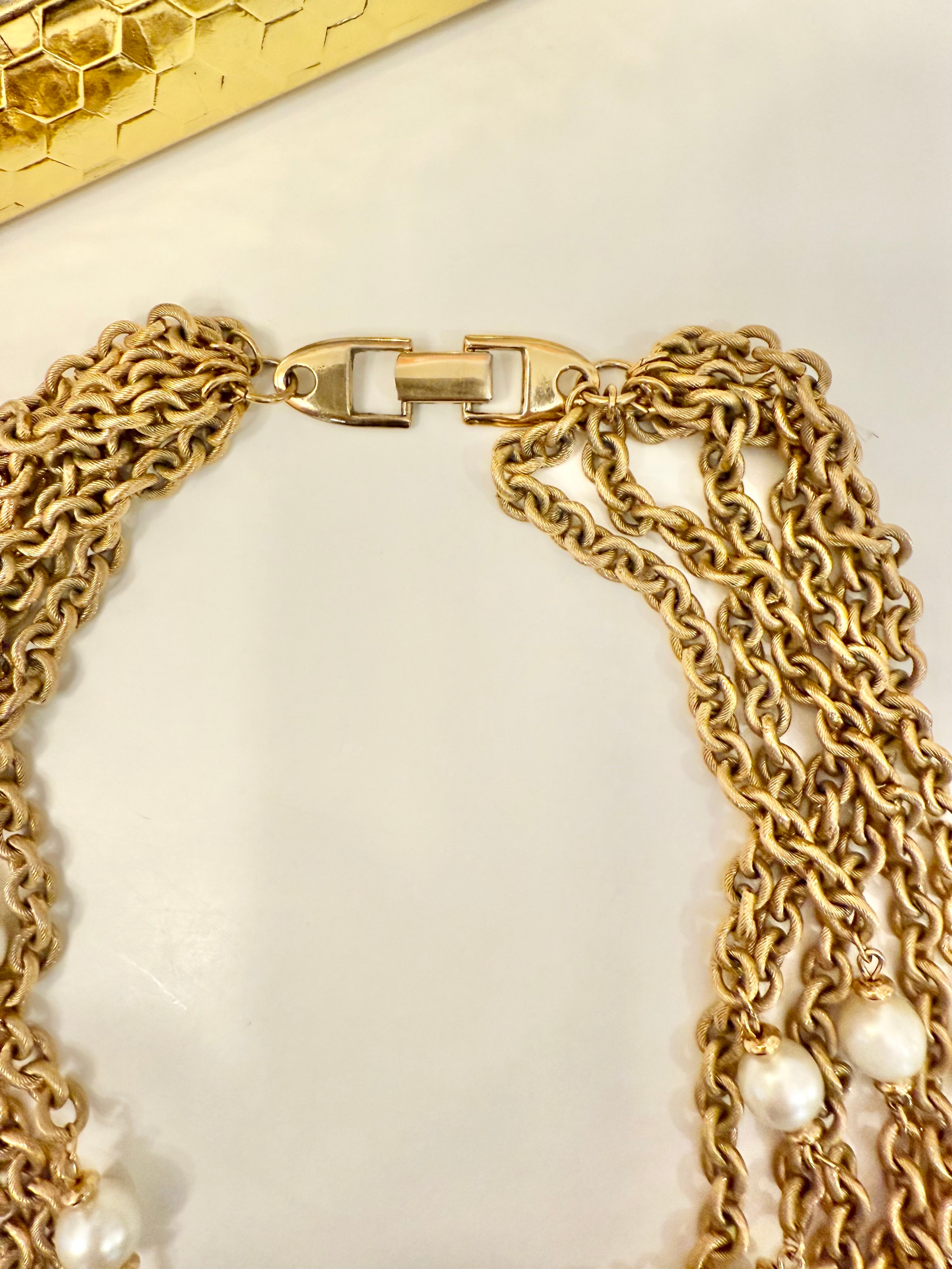 The charming gold chain and pearl necklace by Napier.