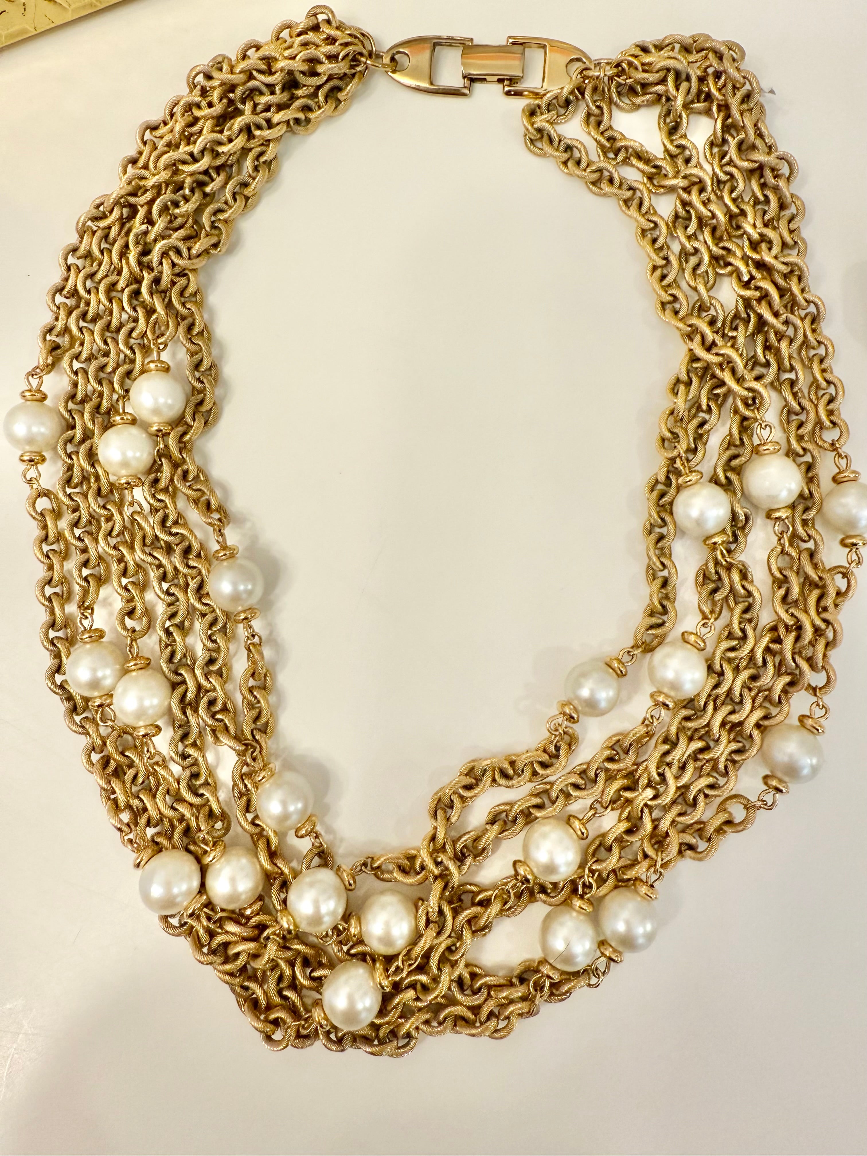 The charming gold chain and pearl necklace by Napier.