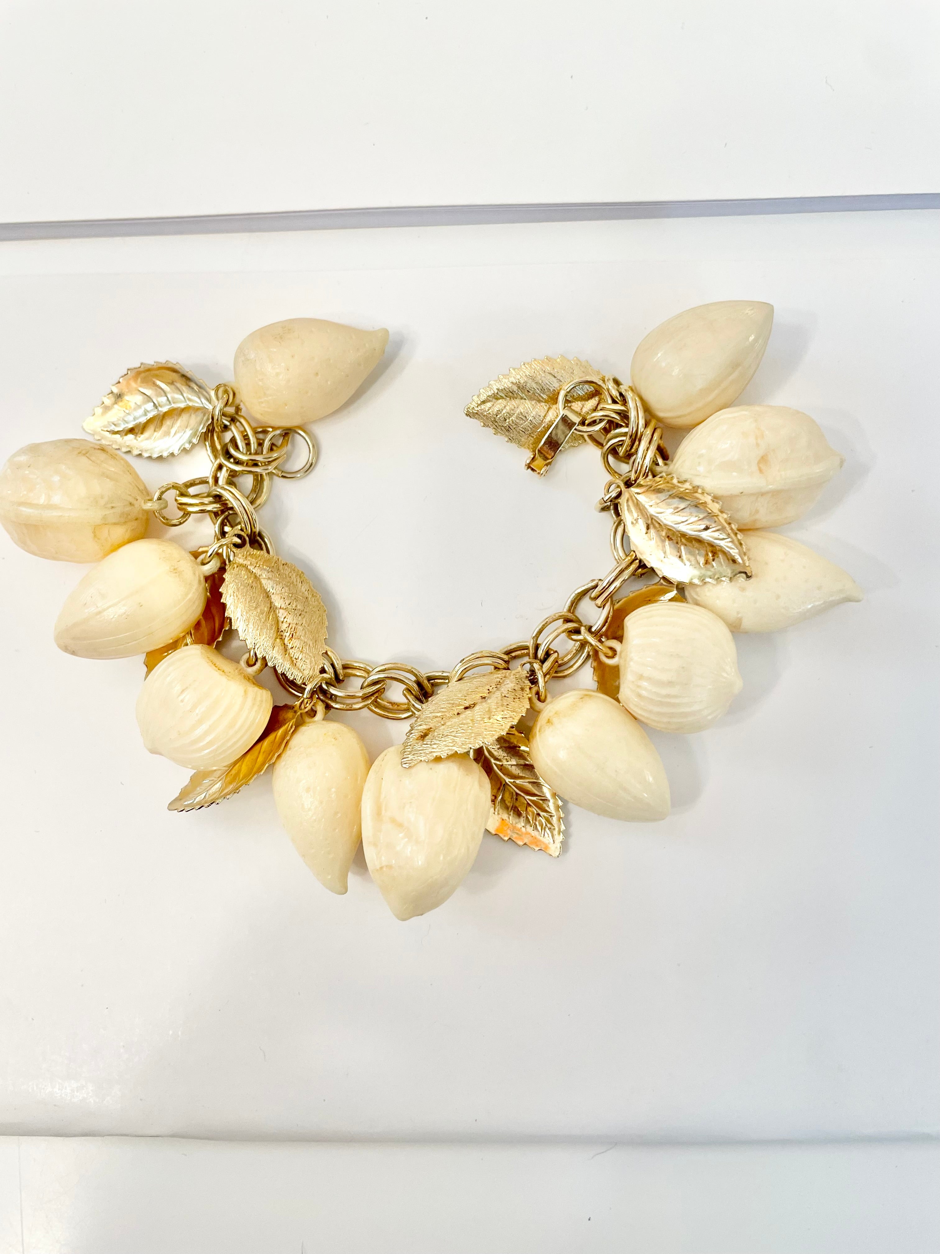 The most charming ivory resin charm bracelet that there was.... so cheeky!