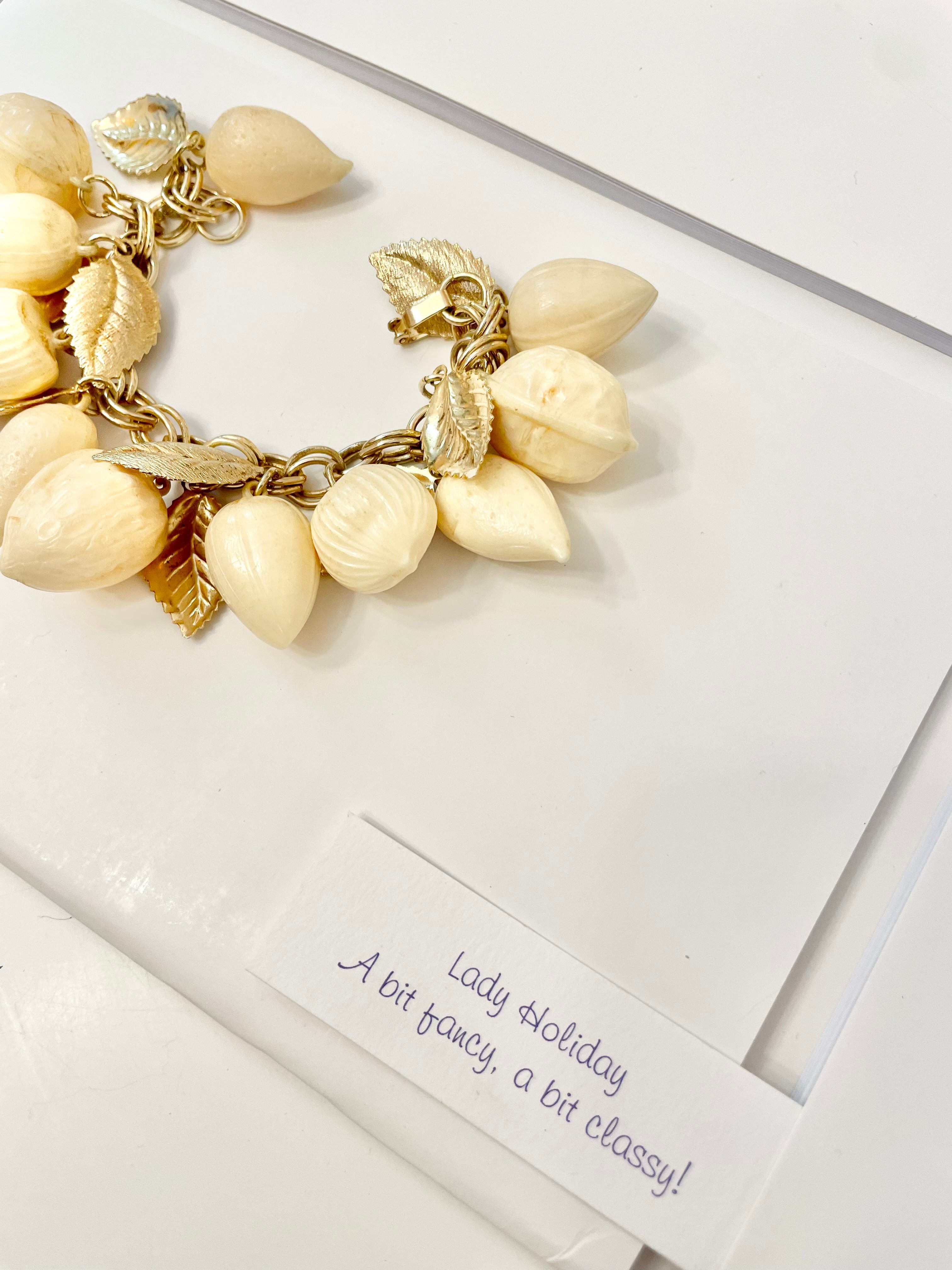 The most charming ivory resin charm bracelet that there was.... so cheeky!