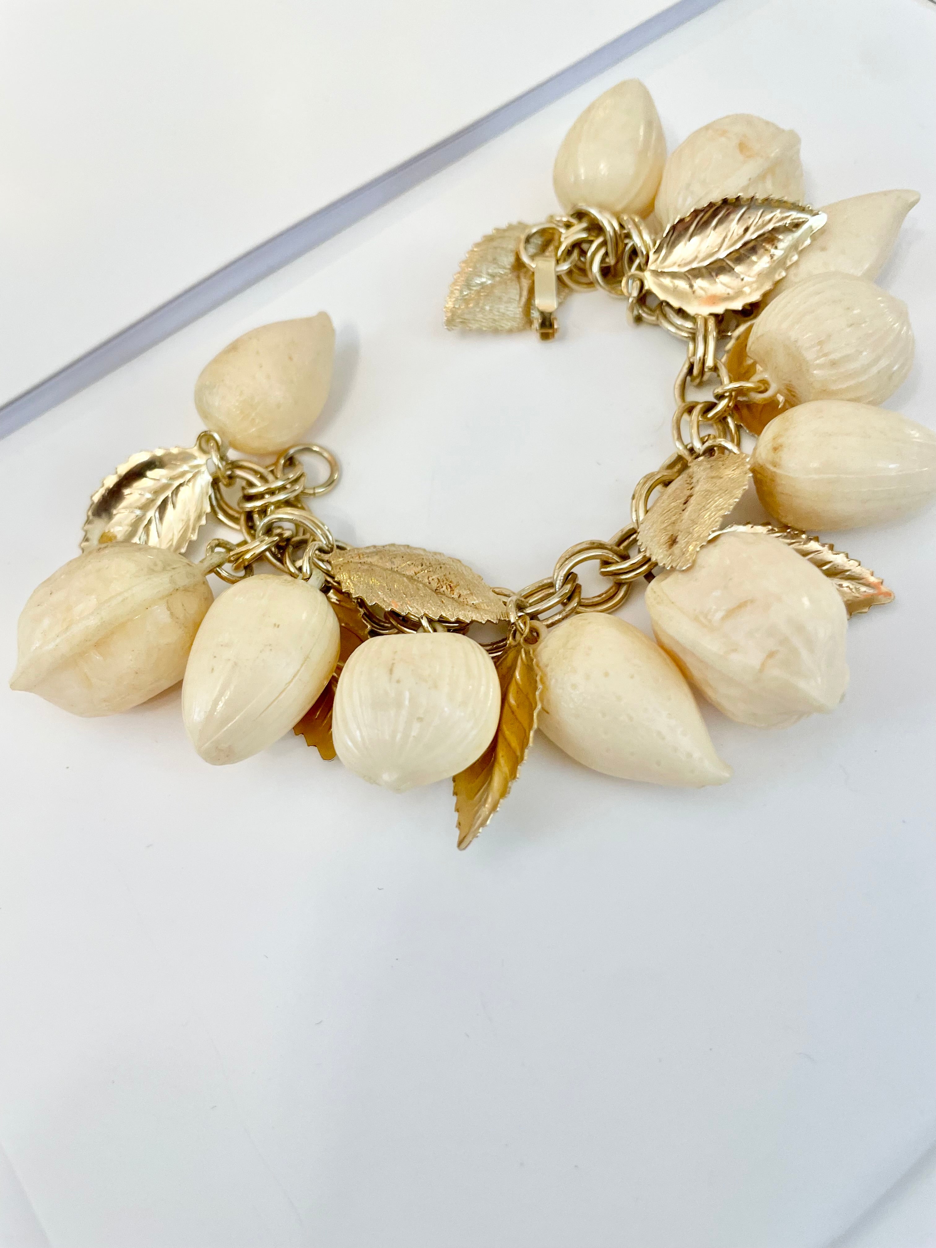 The most charming ivory resin charm bracelet that there was.... so cheeky!