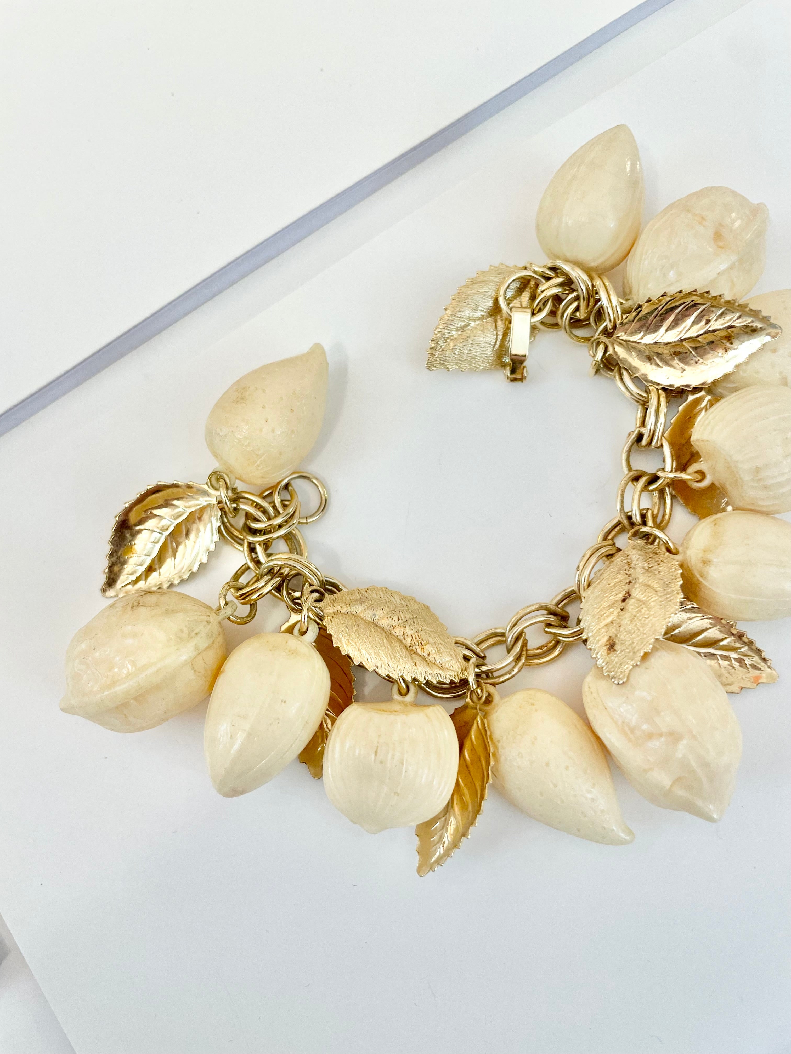 The most charming ivory resin charm bracelet that there was.... so cheeky!