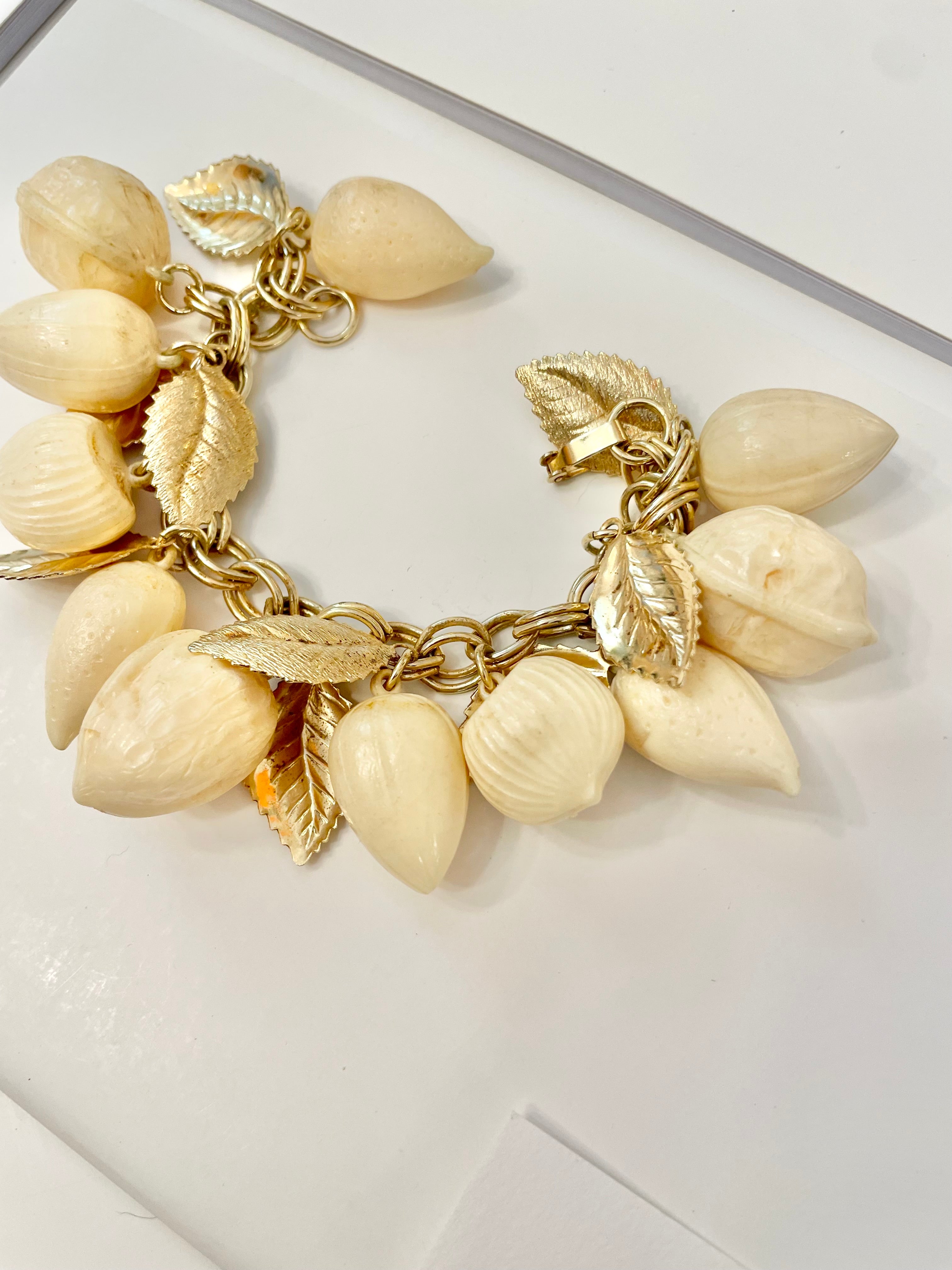 The most charming ivory resin charm bracelet that there was.... so cheeky!