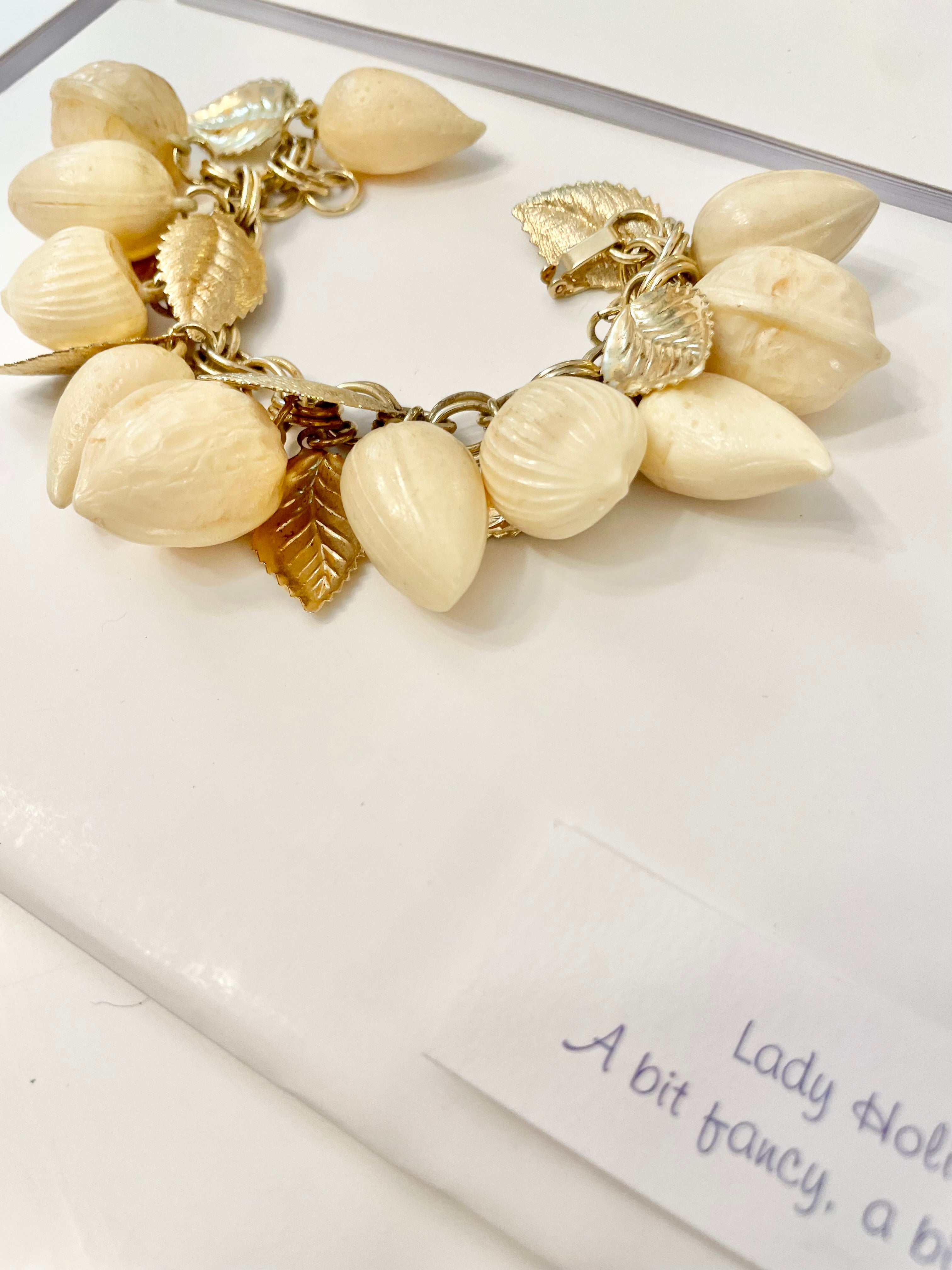 The most charming ivory resin charm bracelet that there was.... so cheeky!