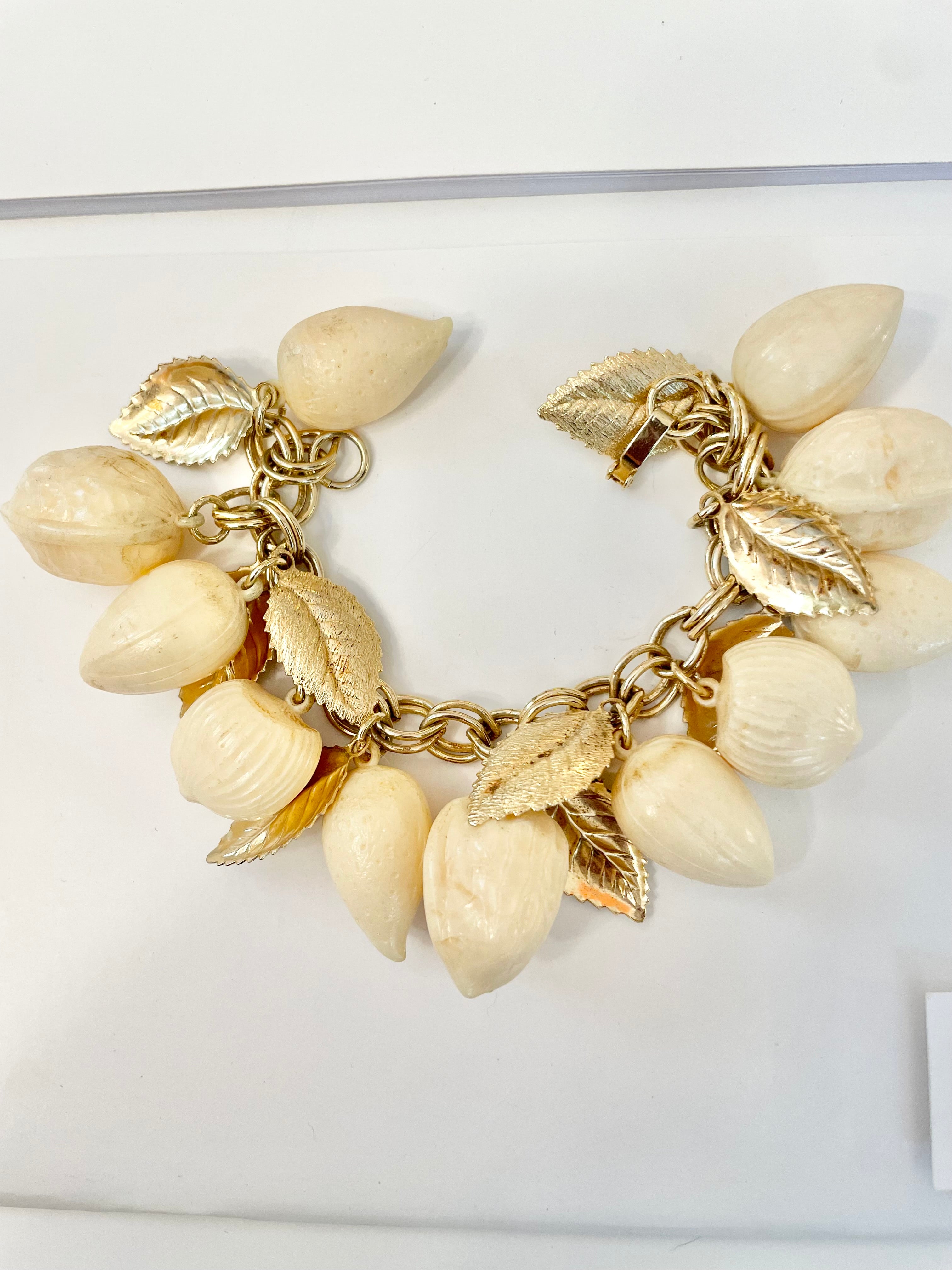 The most charming ivory resin charm bracelet that there was.... so cheeky!