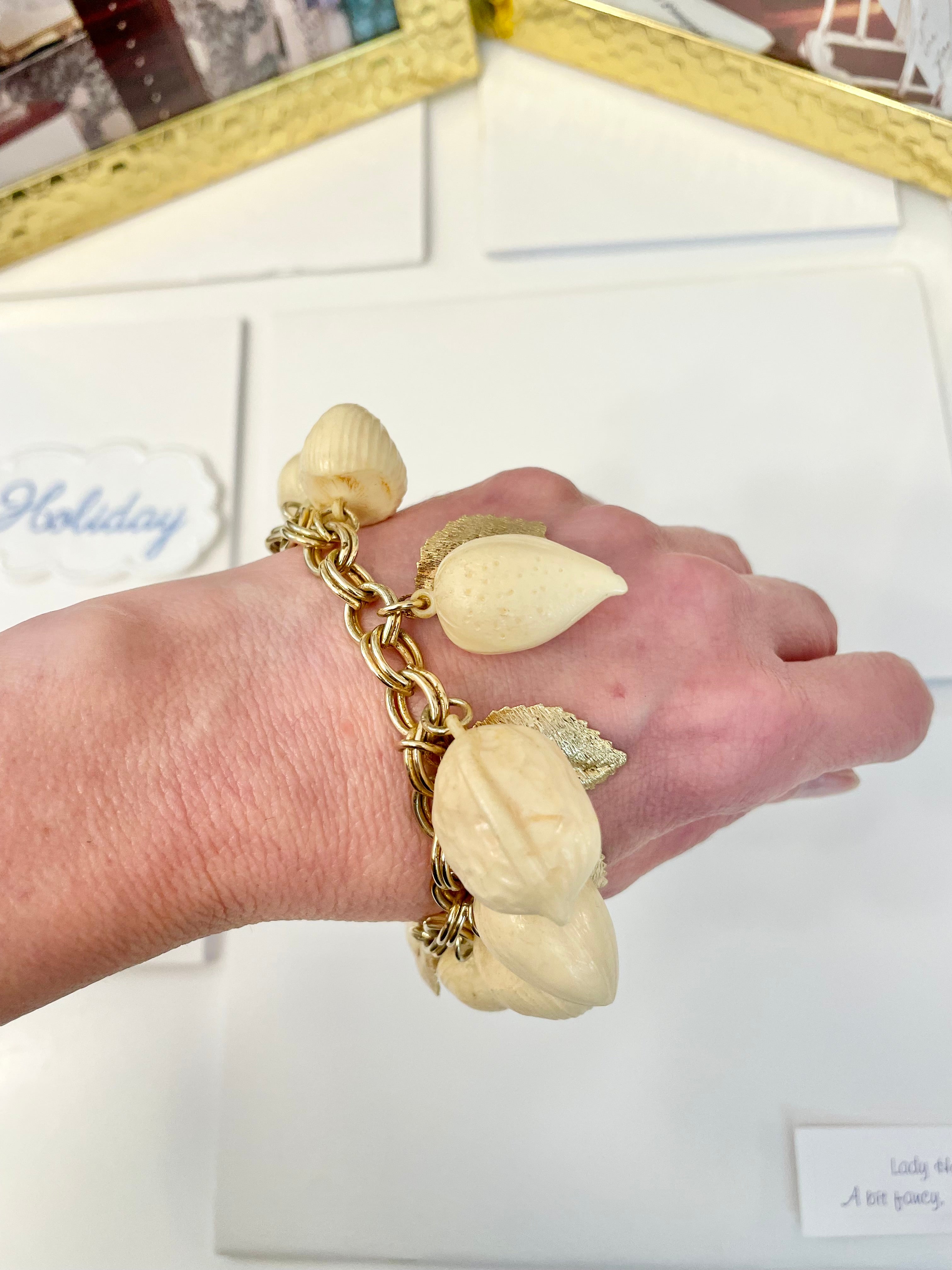 The most charming ivory resin charm bracelet that there was.... so cheeky!