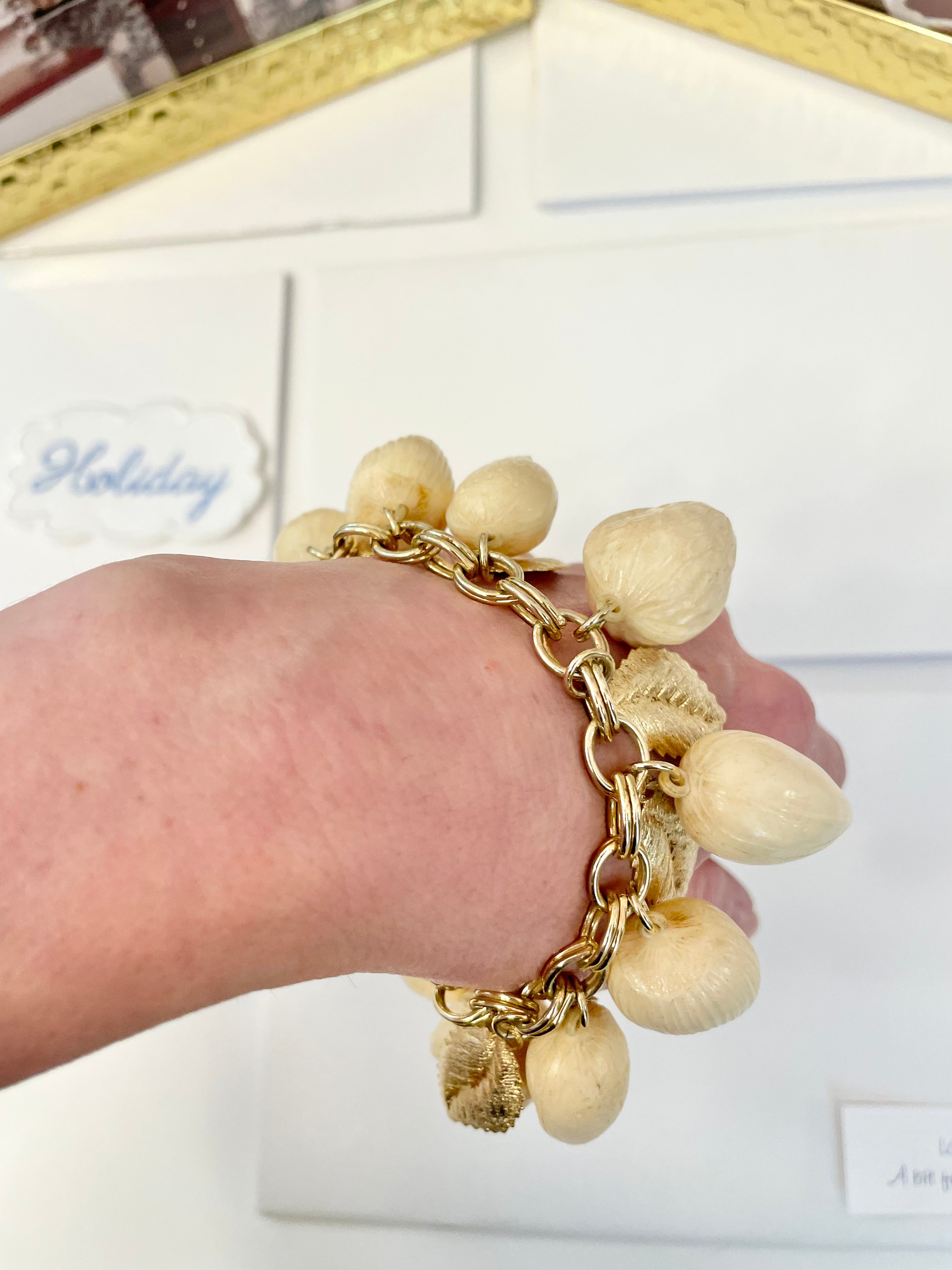 The most charming ivory resin charm bracelet that there was.... so cheeky!