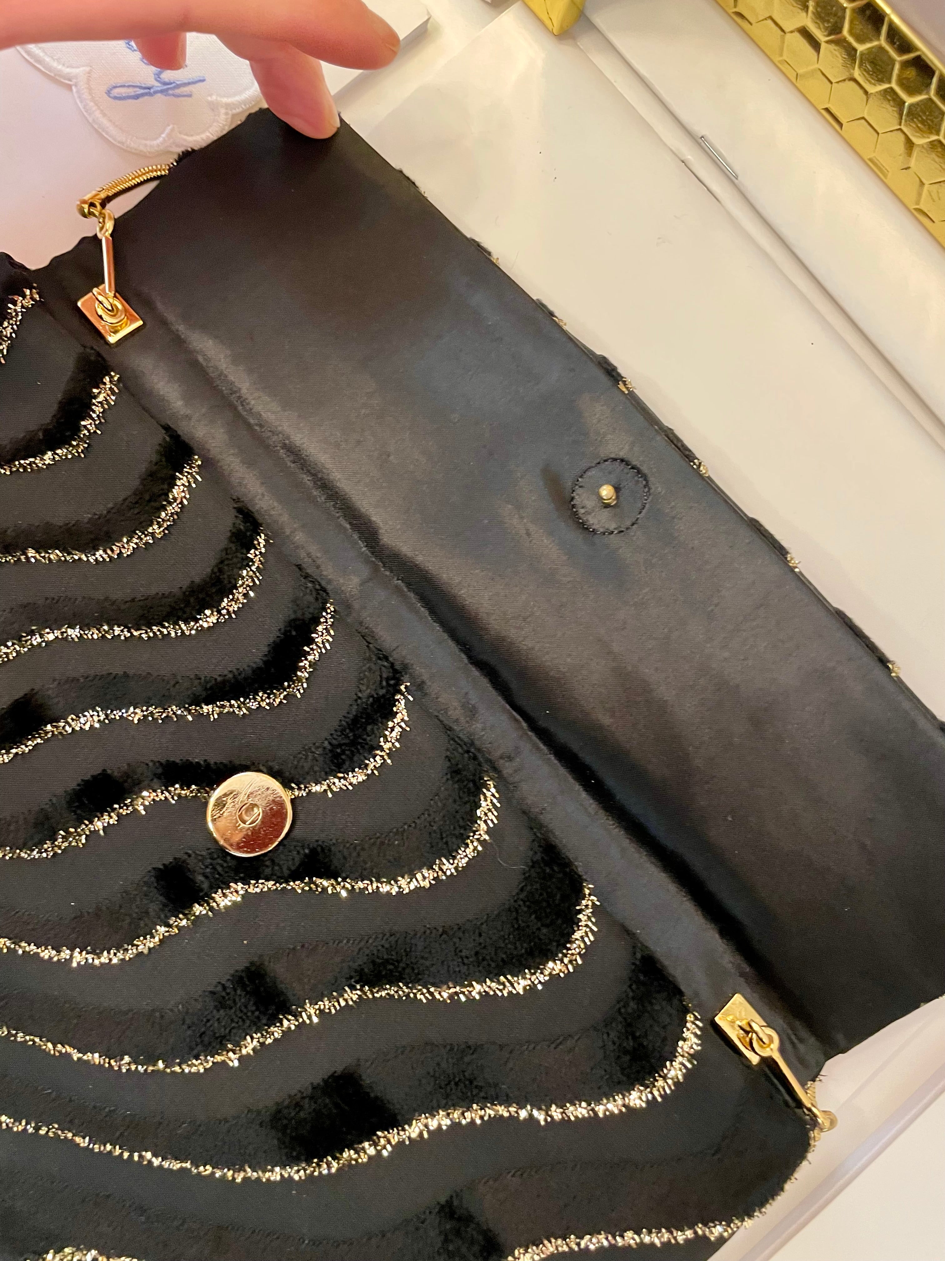 1970's dinner party noir and gold lame clutch bag.... so sassy