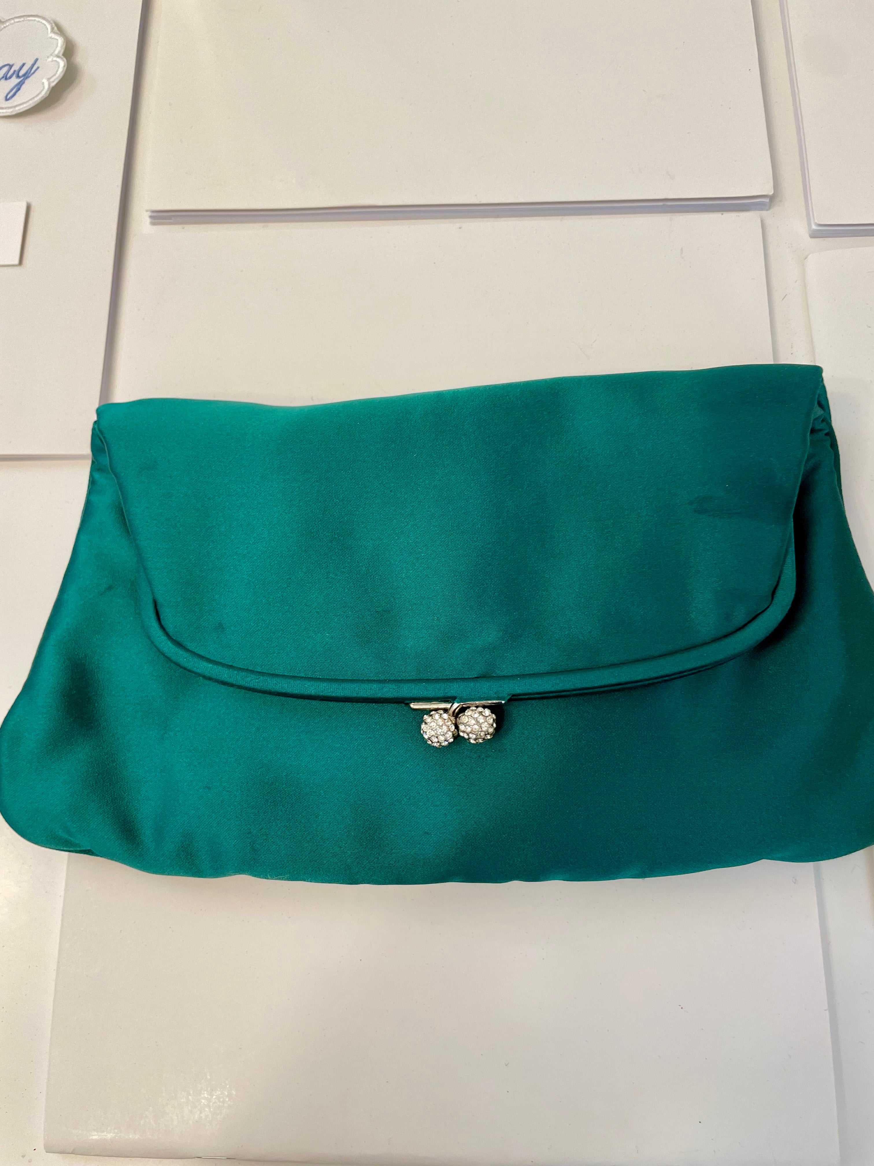 The most divine 1960's emerald green satin evening purse...... so classy!