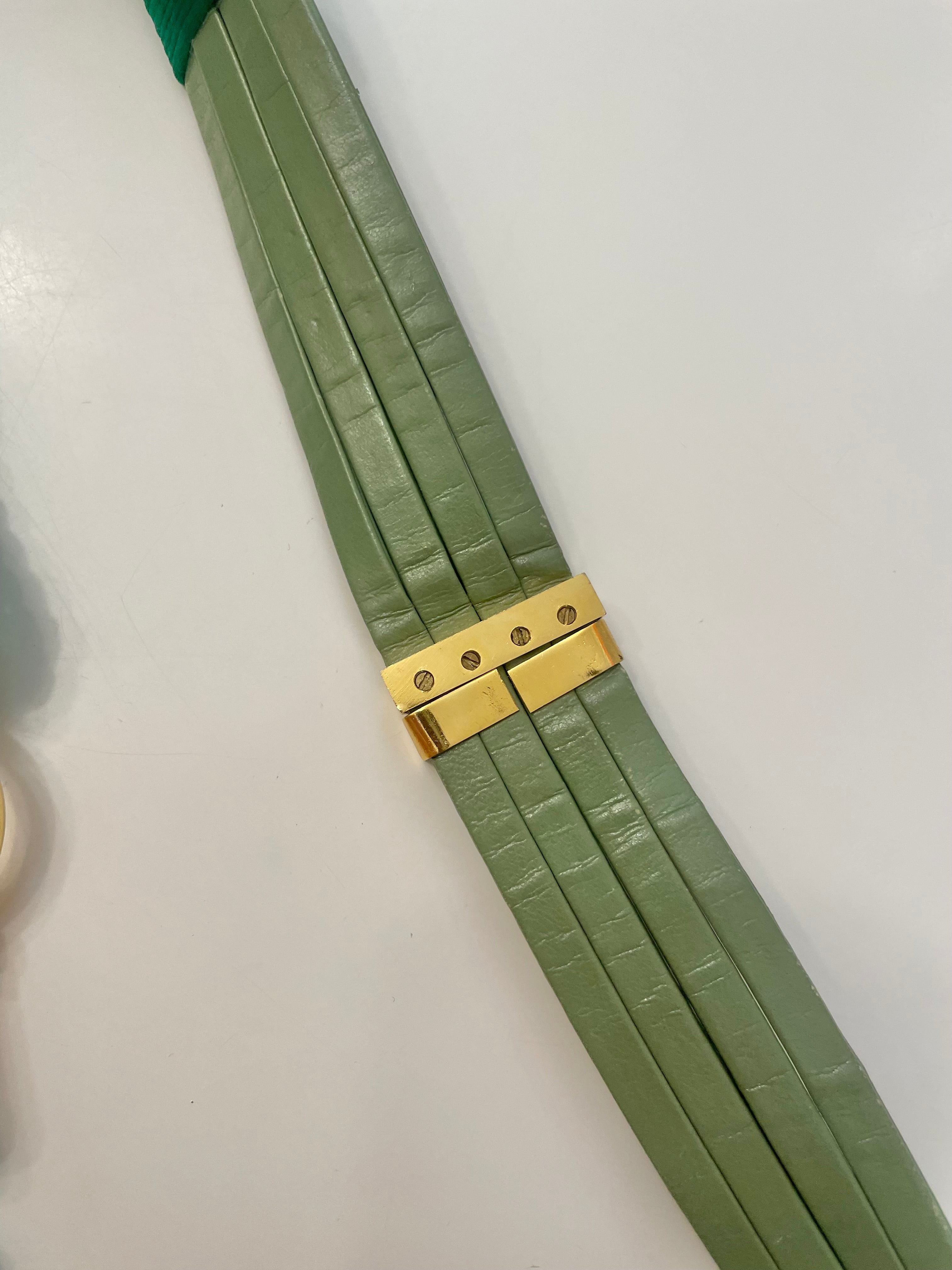 A truly special 1970's belt. I adore this green braided design... oh so chic.