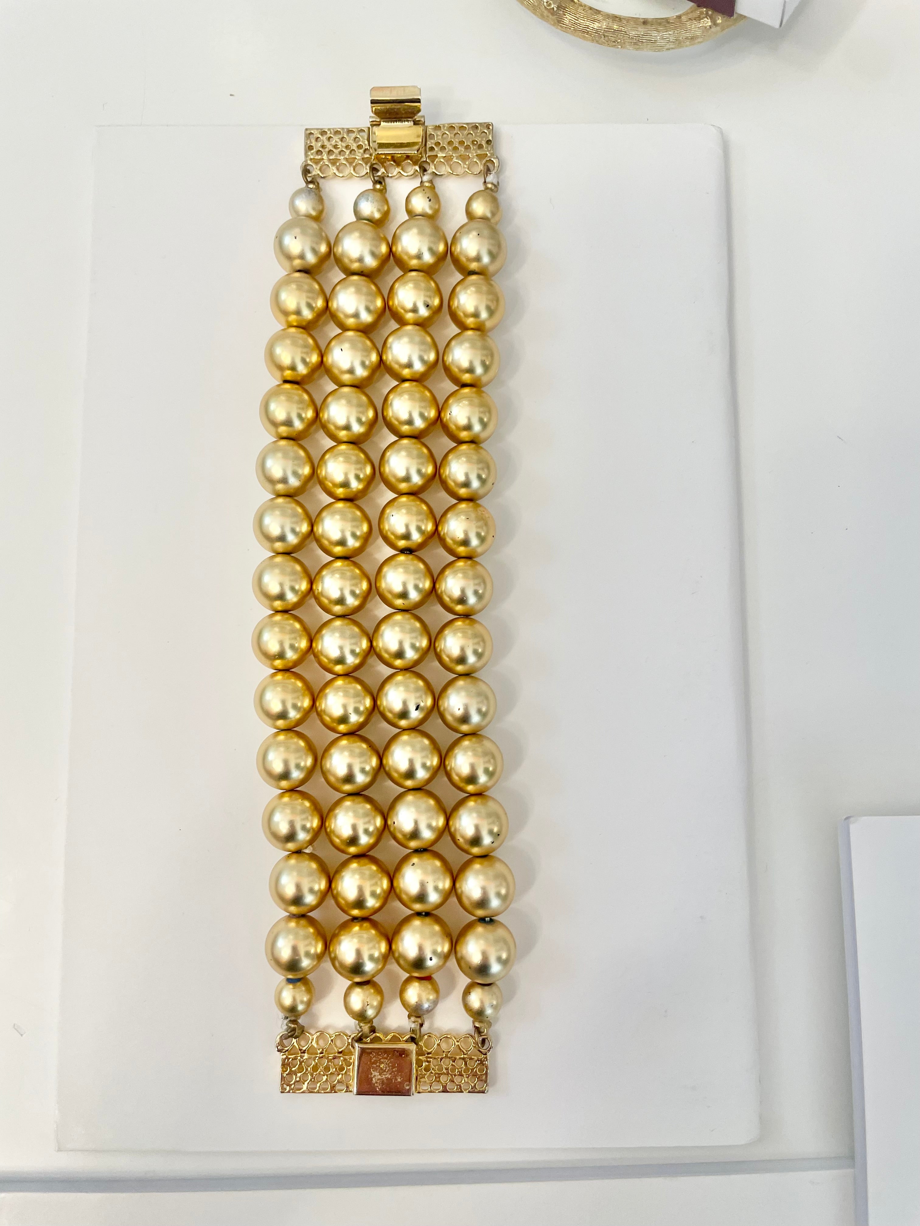 The most charming gold ball multi strand bracelet. ...so darling