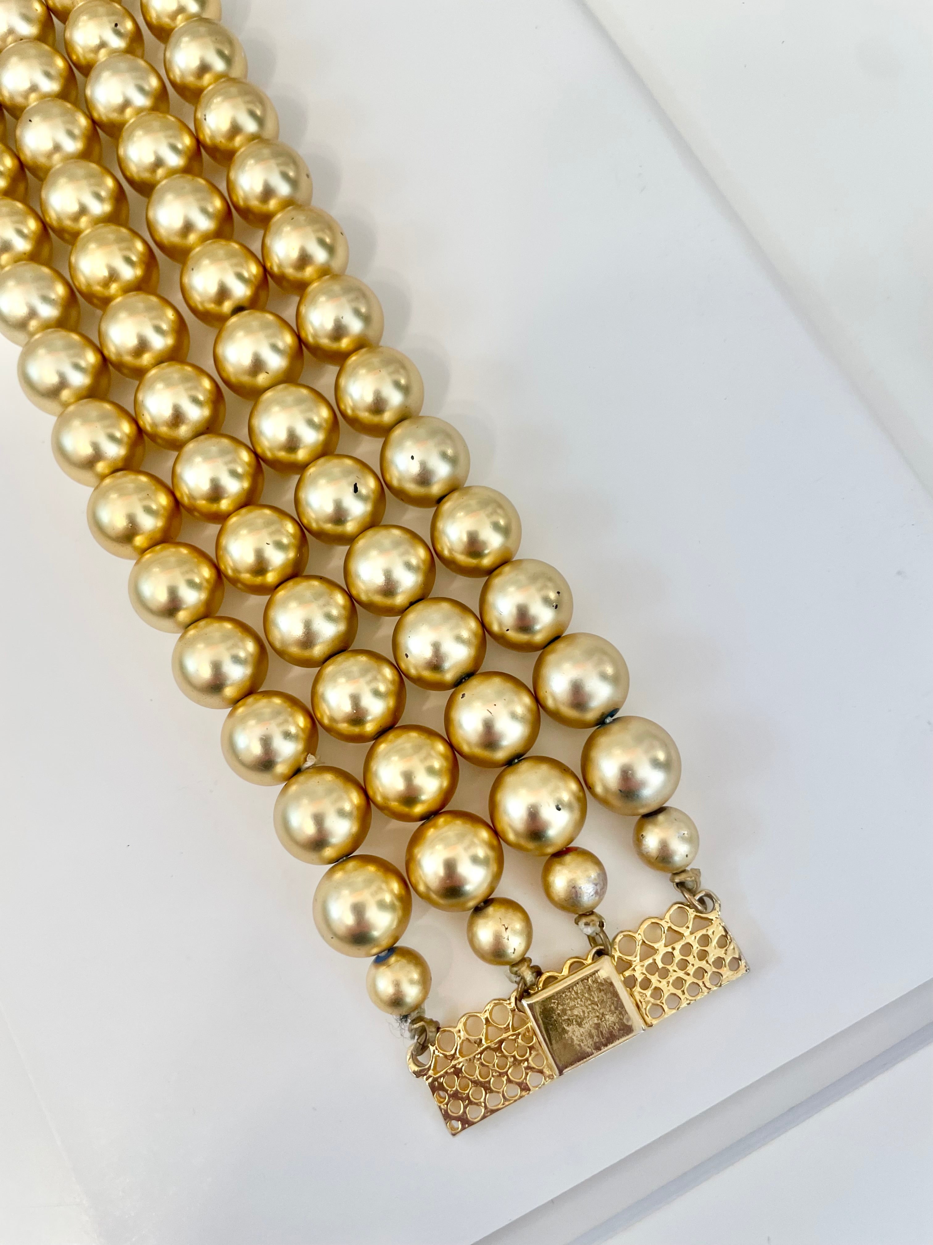 The most charming gold ball multi strand bracelet. ...so darling