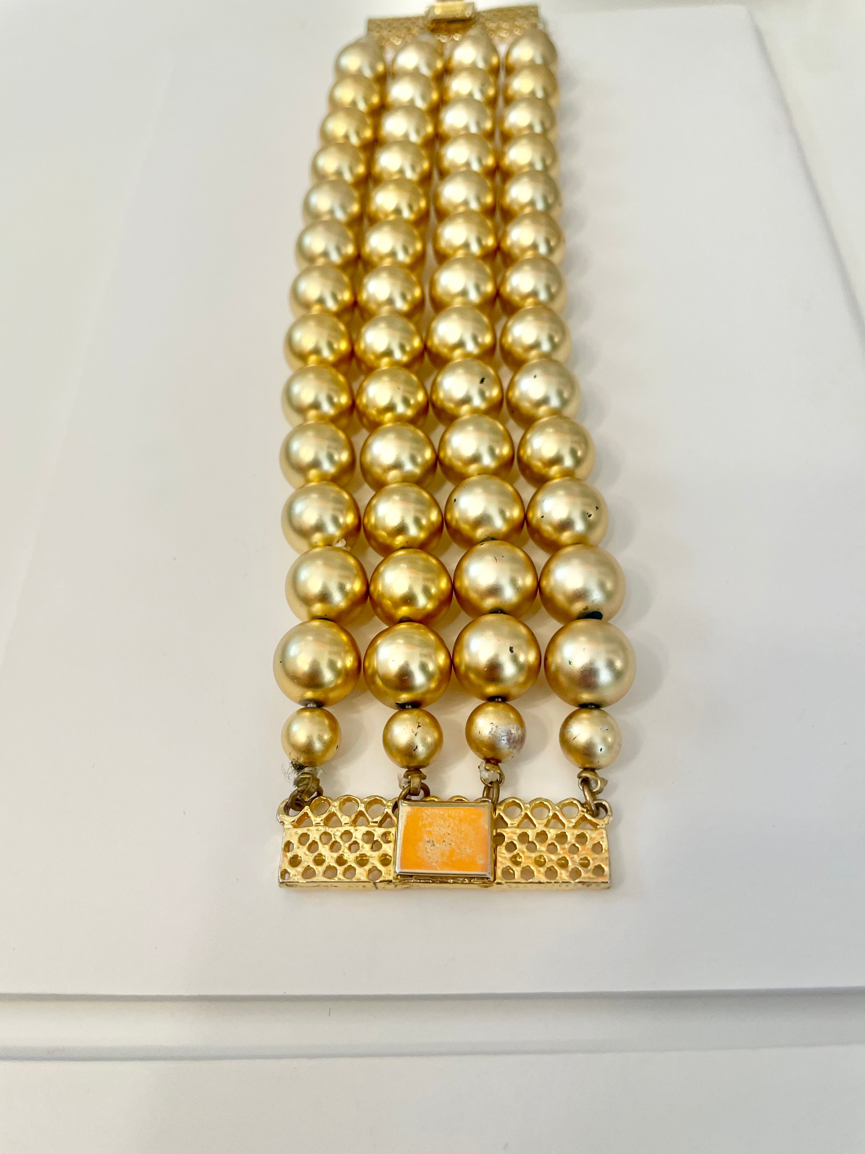 The most charming gold ball multi strand bracelet. ...so darling