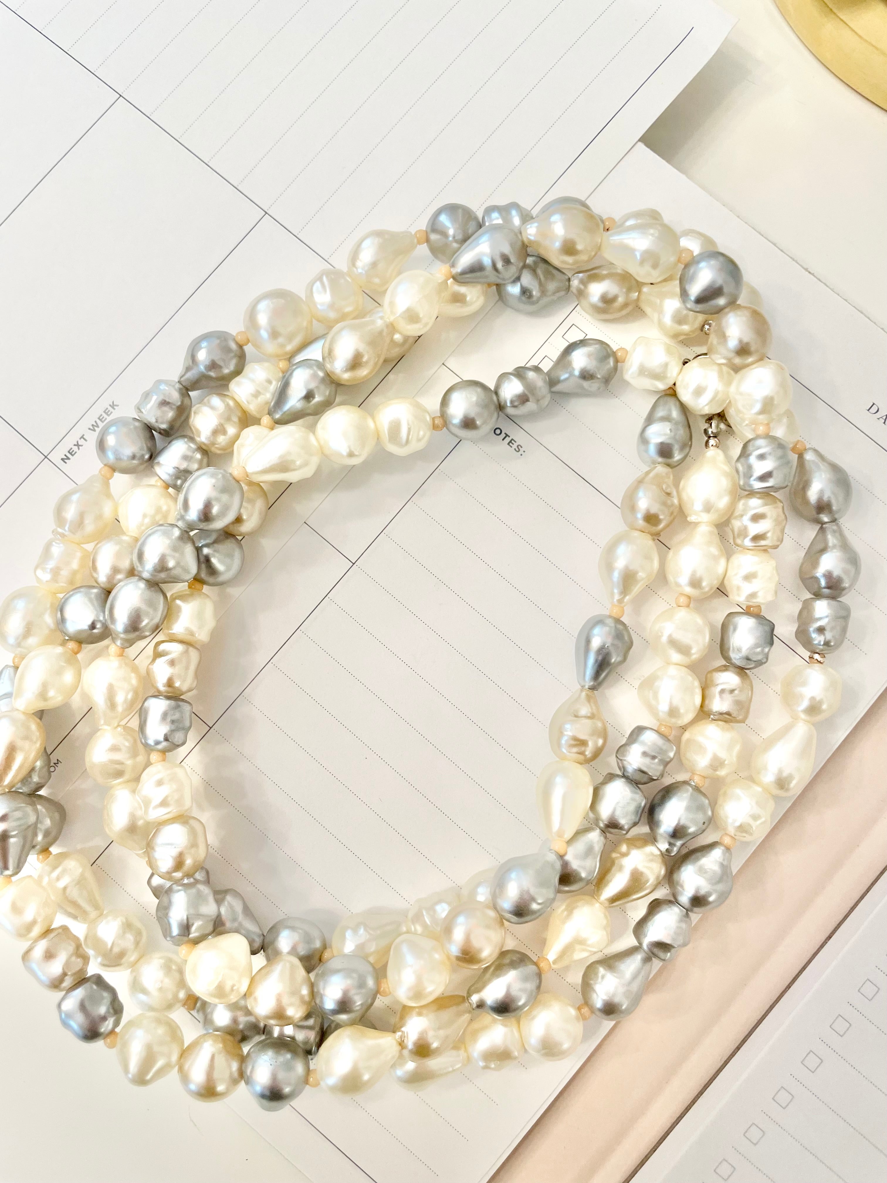 Lovely faux opera length pearls... so chic