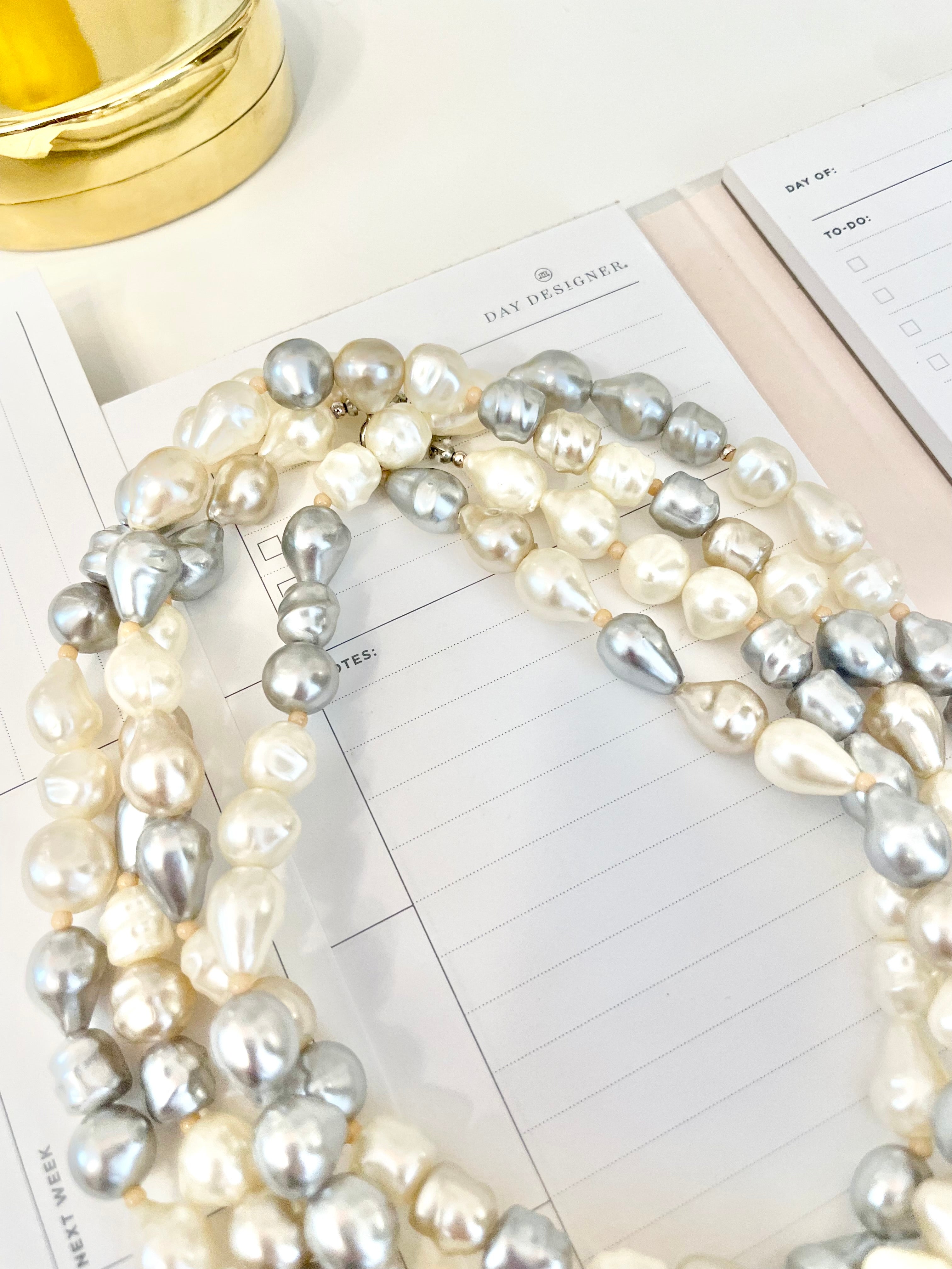 Lovely faux opera length pearls... so chic