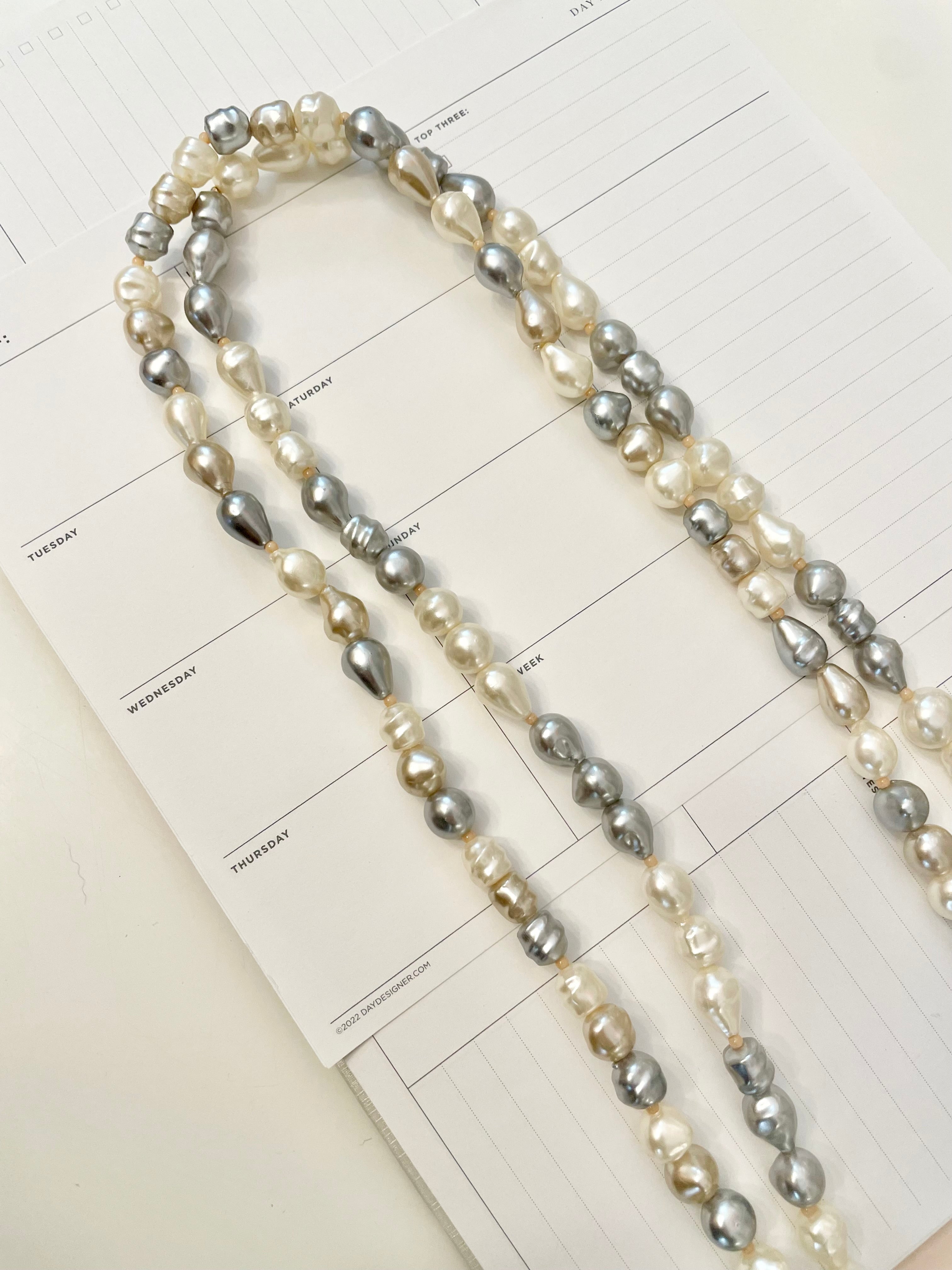 Lovely faux opera length pearls... so chic