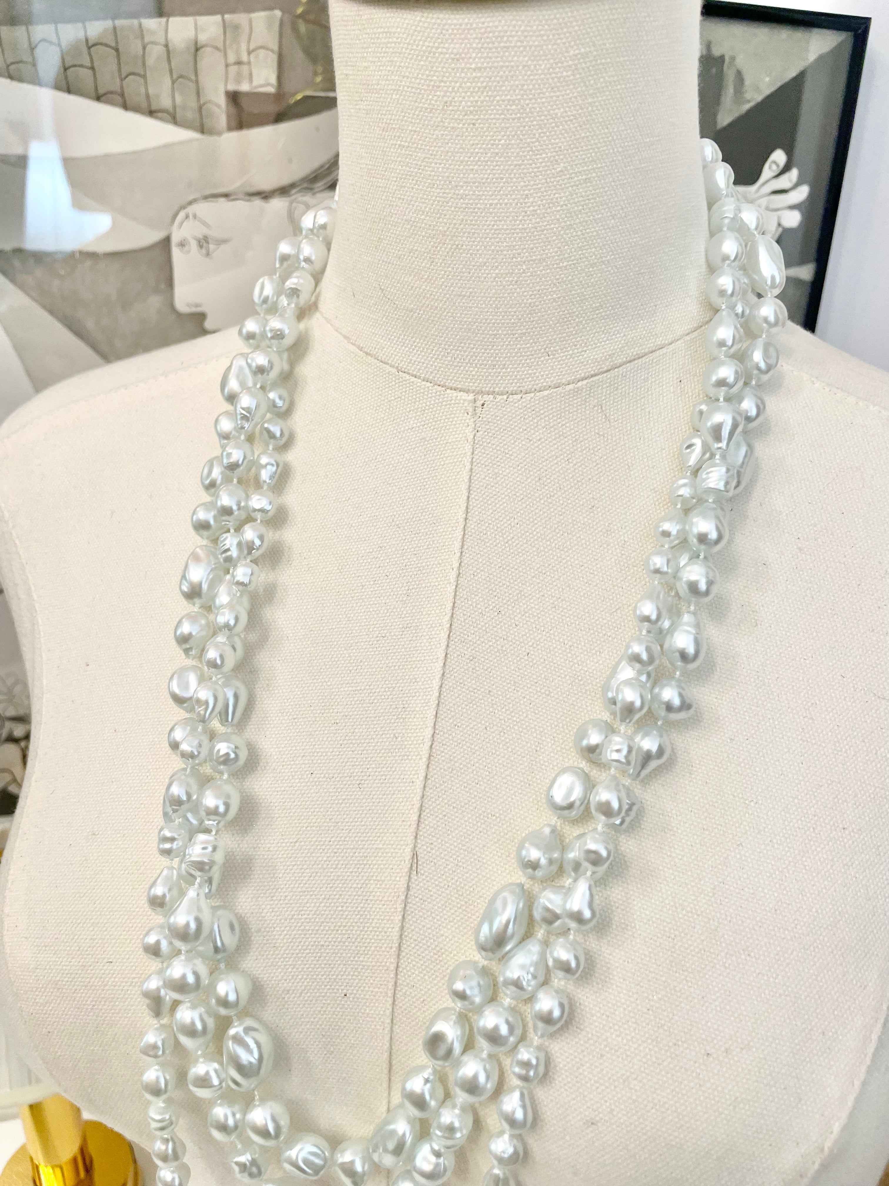 Charming multi strands of faux resin baroque pearl opera length necklaces... so lovely